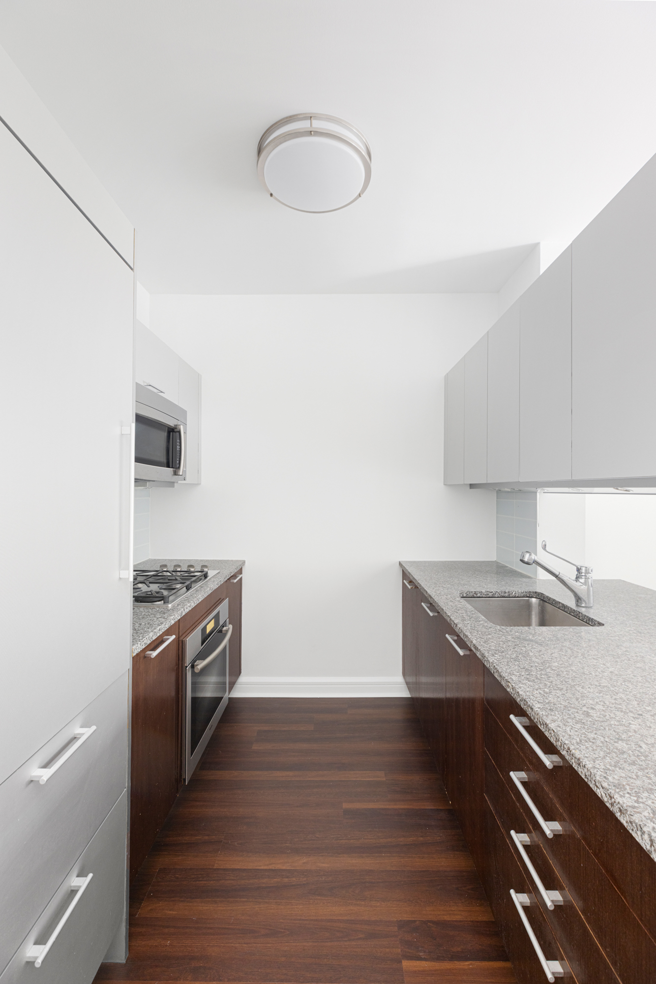 100 Riverside Boulevard, Unit 9B Manhattan, NY 10069 - Photo 4 of 8 a kitchen with a stove and a sink