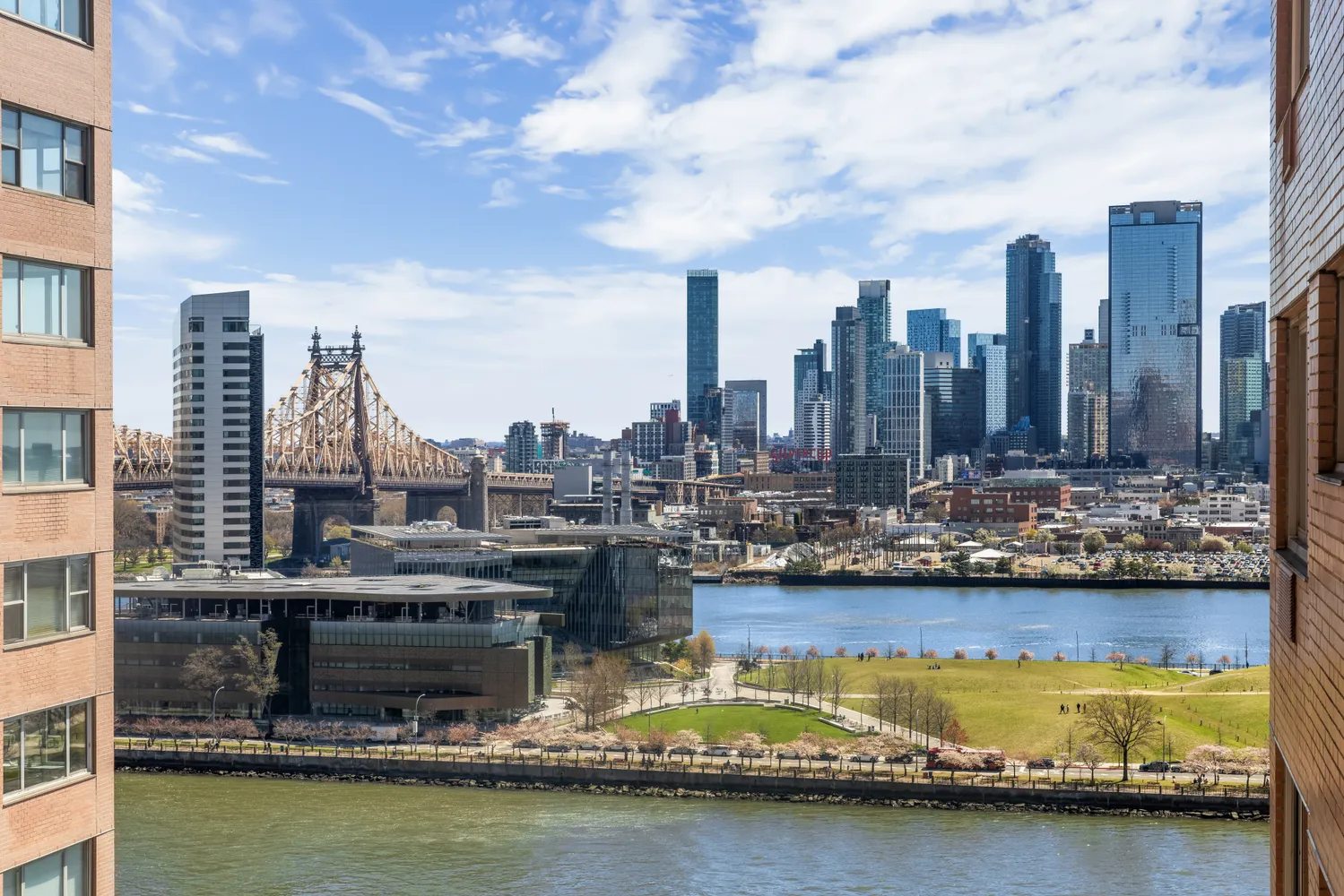 a view of a city with tall buildings