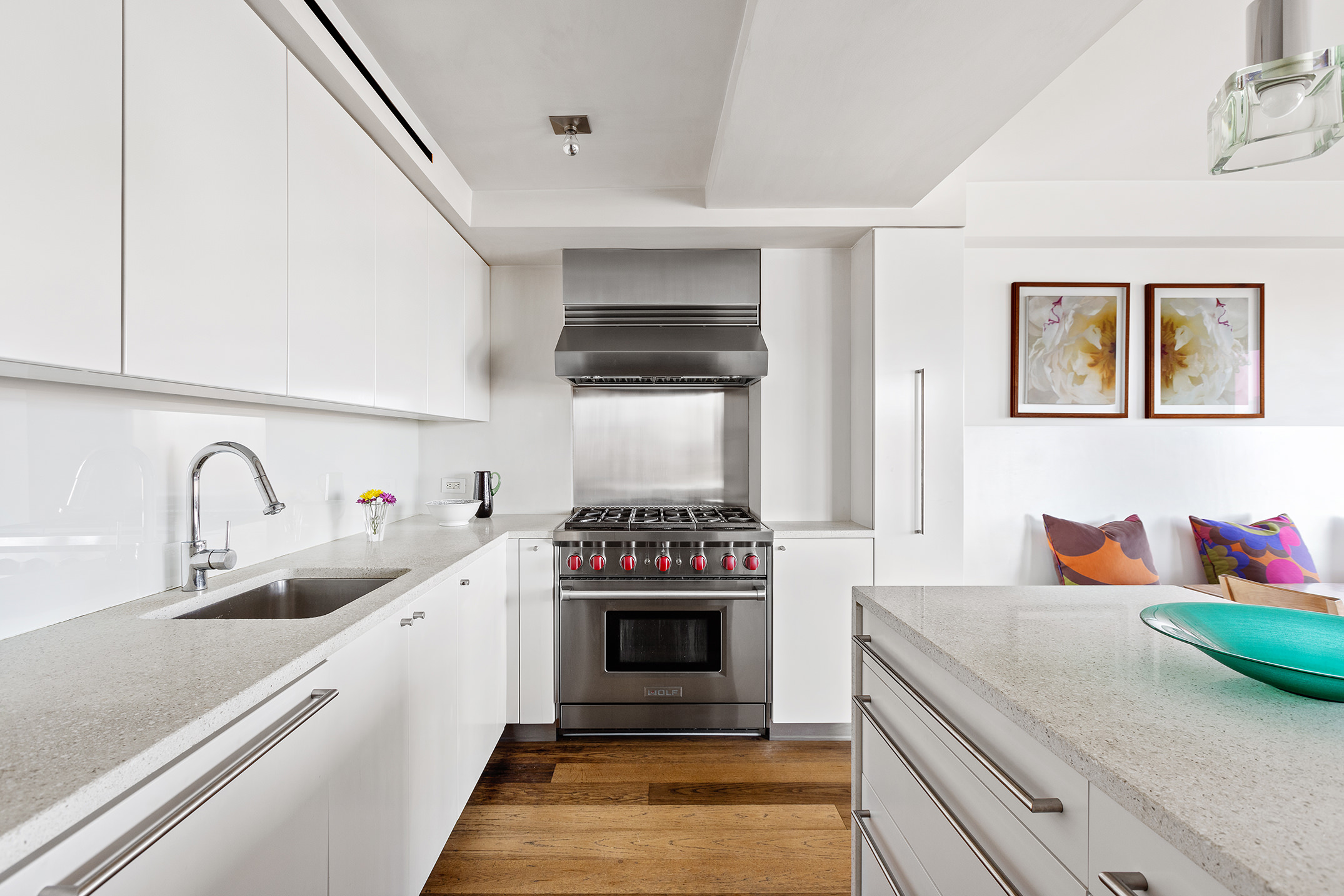 45 East End Avenue, Unit 6/7B Manhattan, NY 10028 - Photo 5 of 17 a kitchen with a stove and cabinets