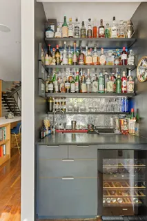 a room with lots of bottles of alcohol