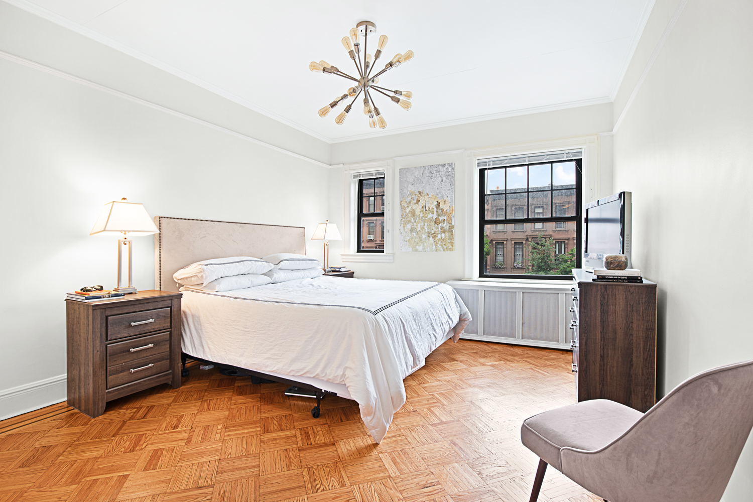 392 9th Street Brooklyn, NY 11215 - Photo 6 of 11 a bed room with a bed window and a chair