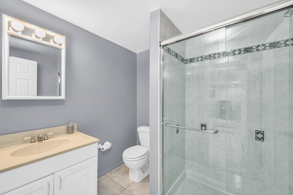 35 Poe Street Staten Island, NY 10307 - Photo 29 of 36 a bathroom with a sink a toilet and shower