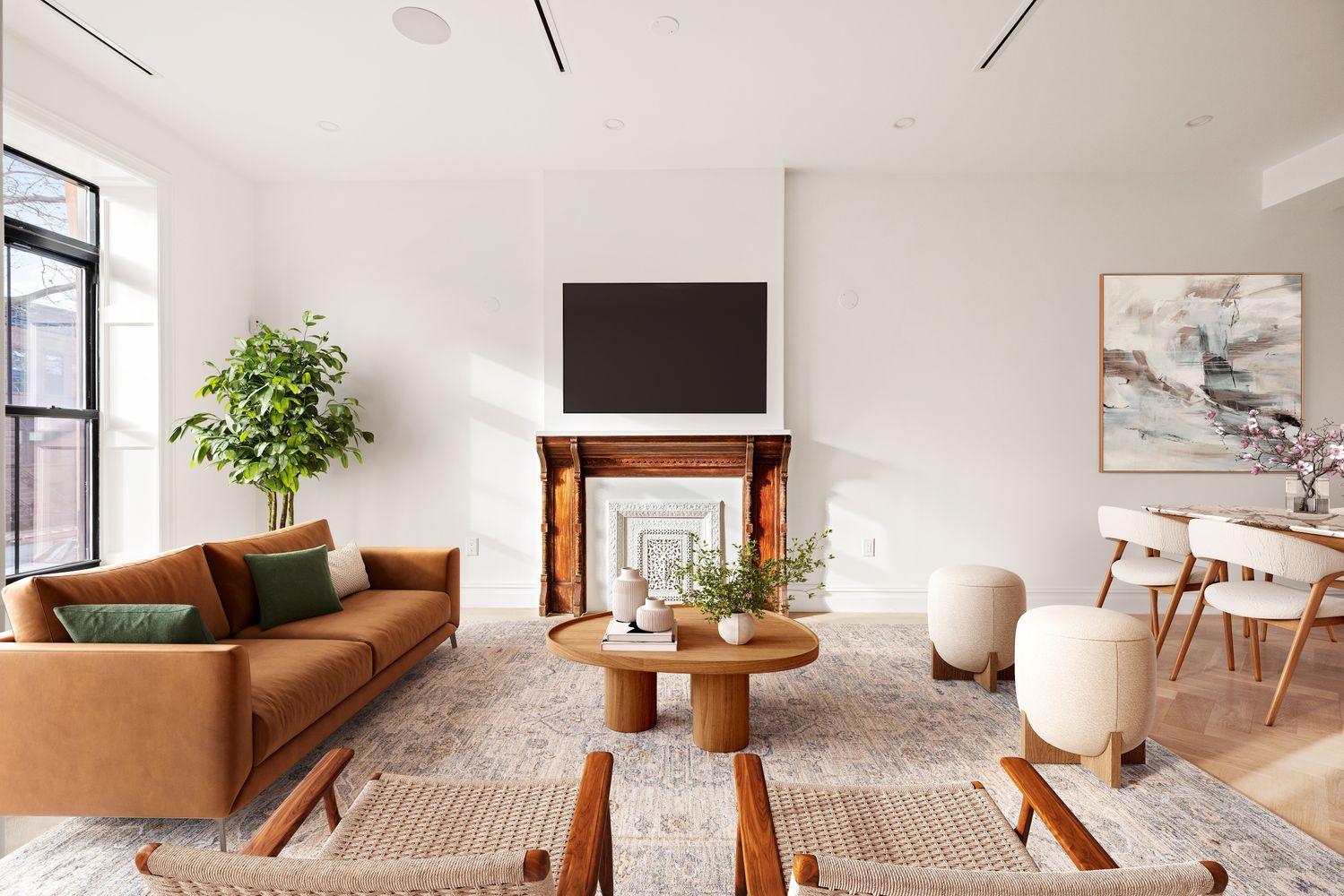 a living room with furniture a potted plant and a large window