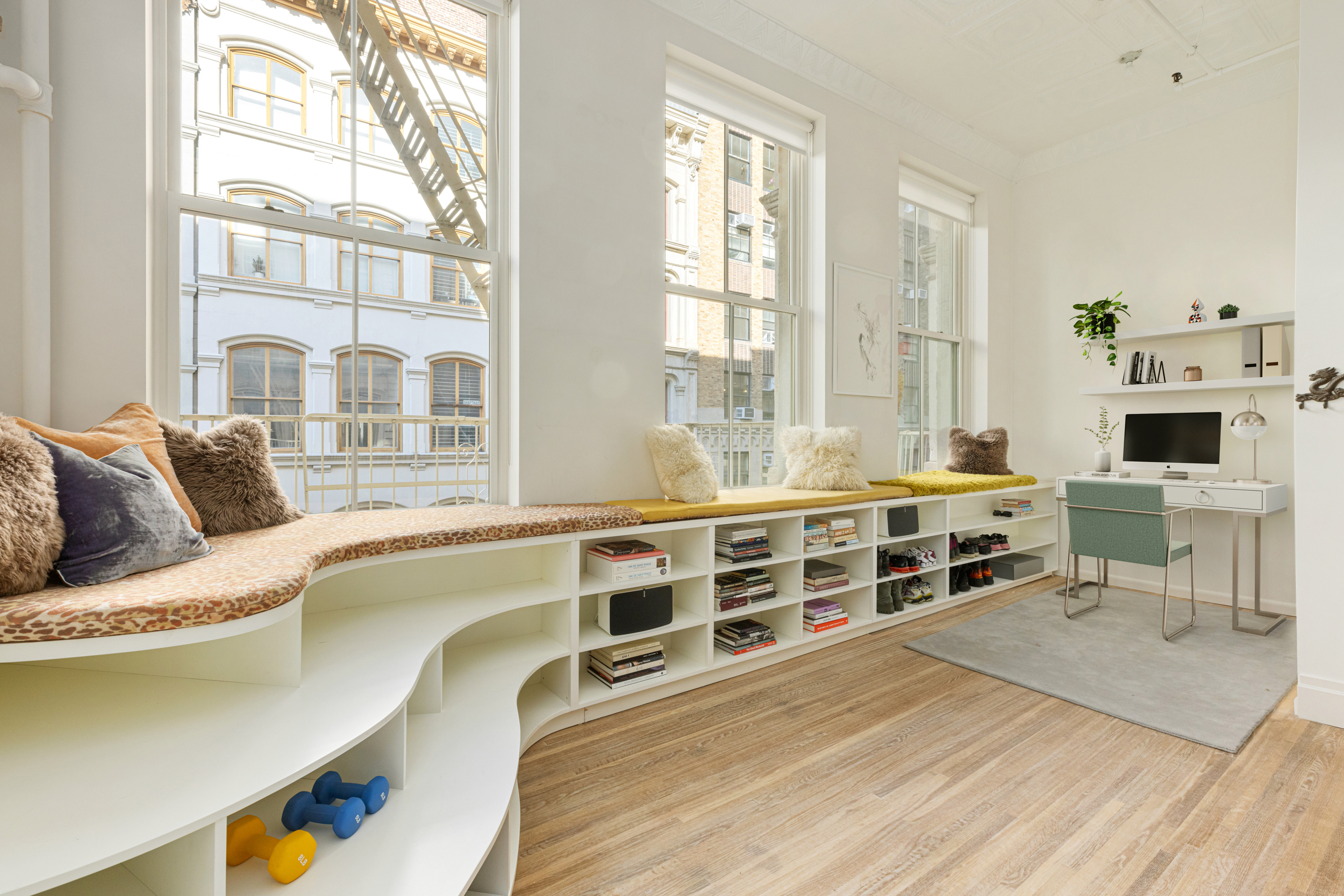 55 Walker Street, Unit 3A Manhattan, NY 10013 - Photo 5 of 12 a living room with furniture flat screen tv and a fireplace