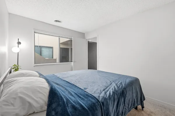 a kitchen with a sink and refrigerator