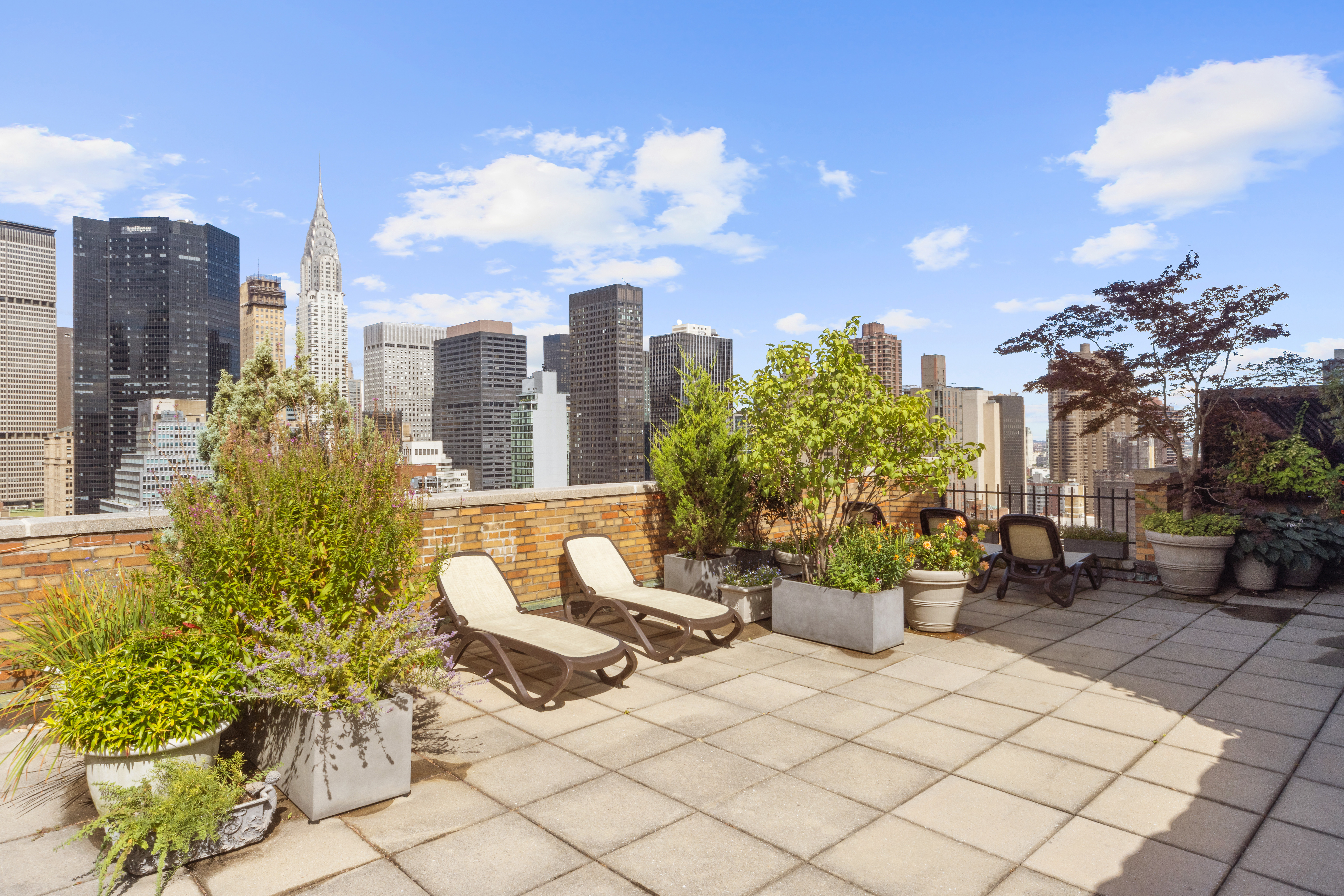 10 Park Avenue, Unit 26A Manhattan, NY 10016 - Photo 8 of 10 a view of a terrace with sitting area