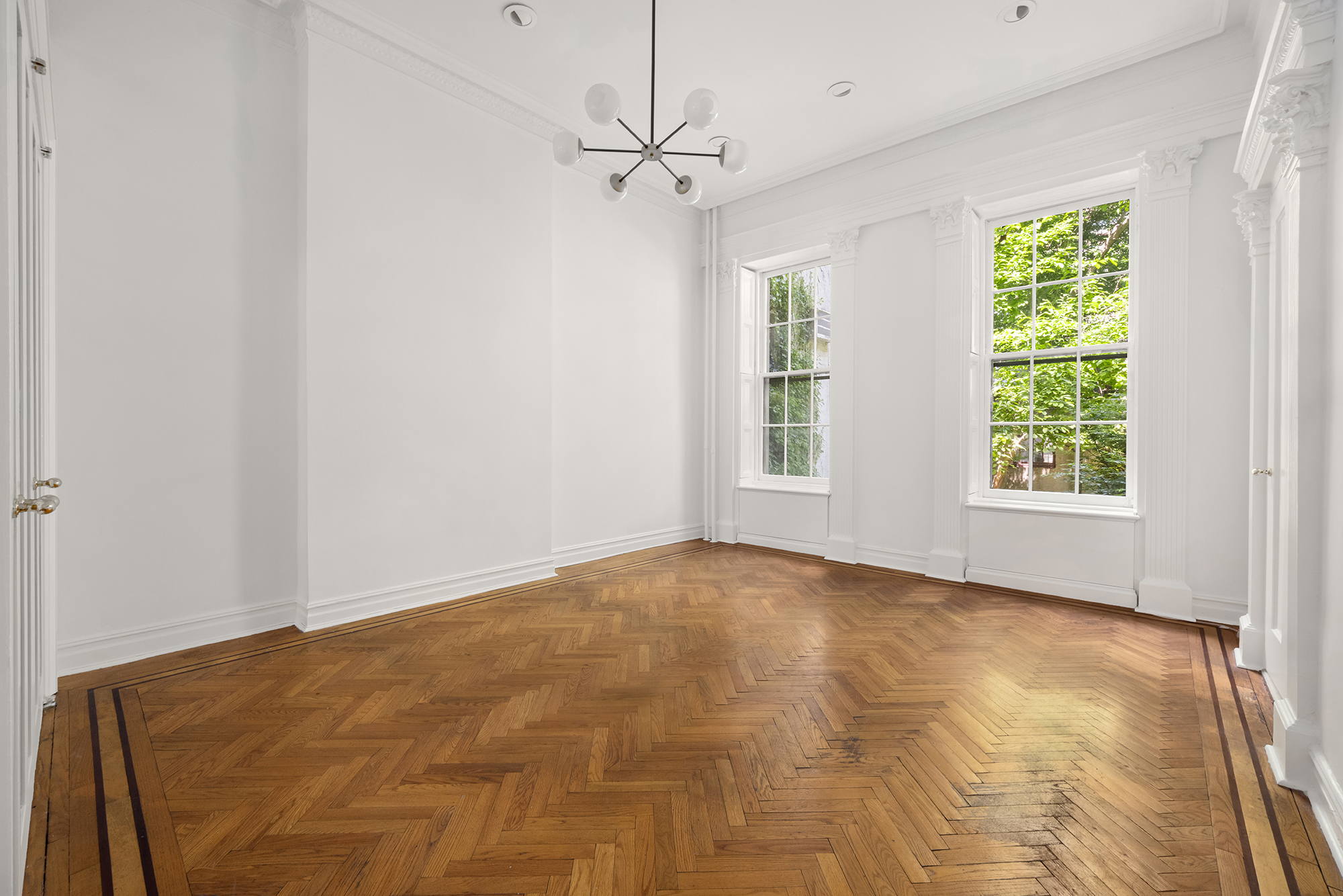 57 West 9th Street Manhattan, NY 10011 - Photo 4 of 11 a view of an empty room with a window