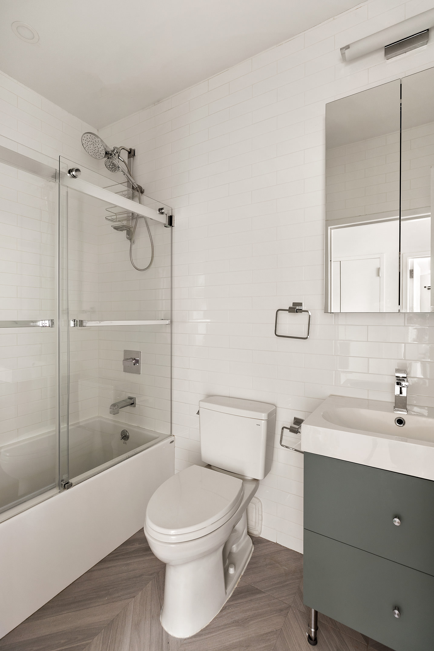 356 7th Avenue, Unit 2 Brooklyn, NY 11215 - Photo 6 of 7 a bathroom with a sink toilet and shower