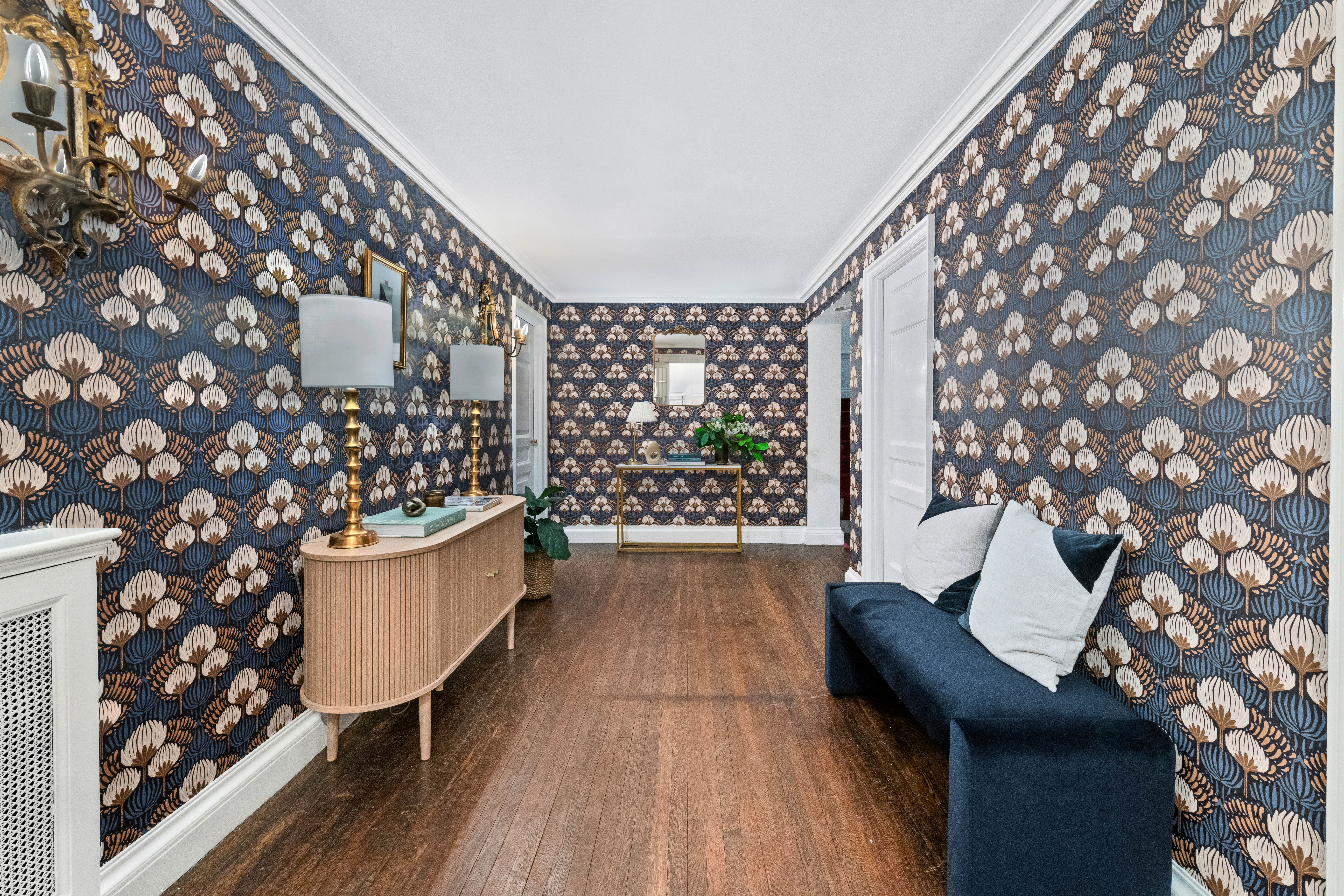 155 East 70th Street Manhattan, NY 10021 - Photo 17 of 27 a room with wooden floor and furniture