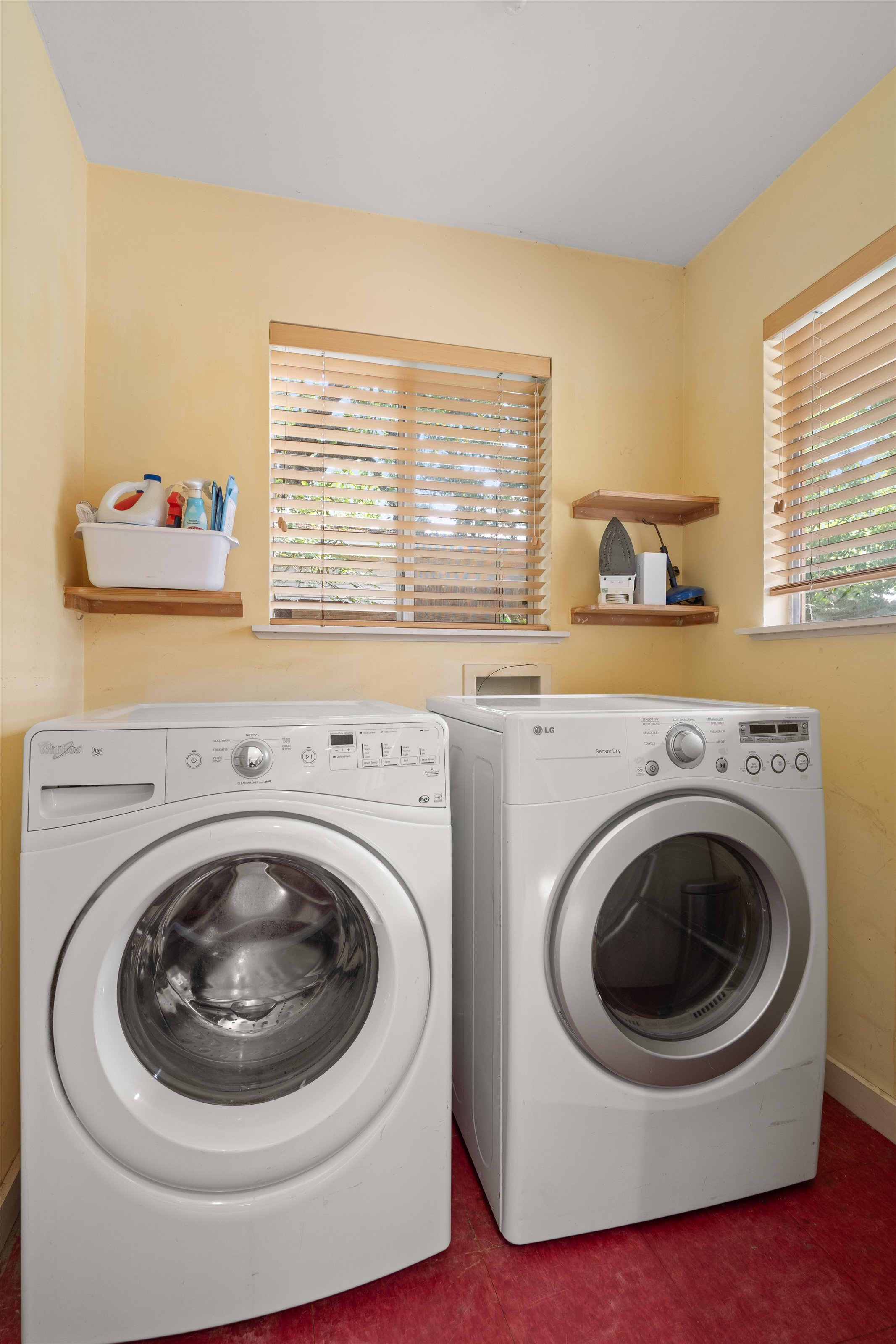 4614 Jinx Avenue Austin, TX 78745 - Photo 12 of 40 a utility room with dryer and washer