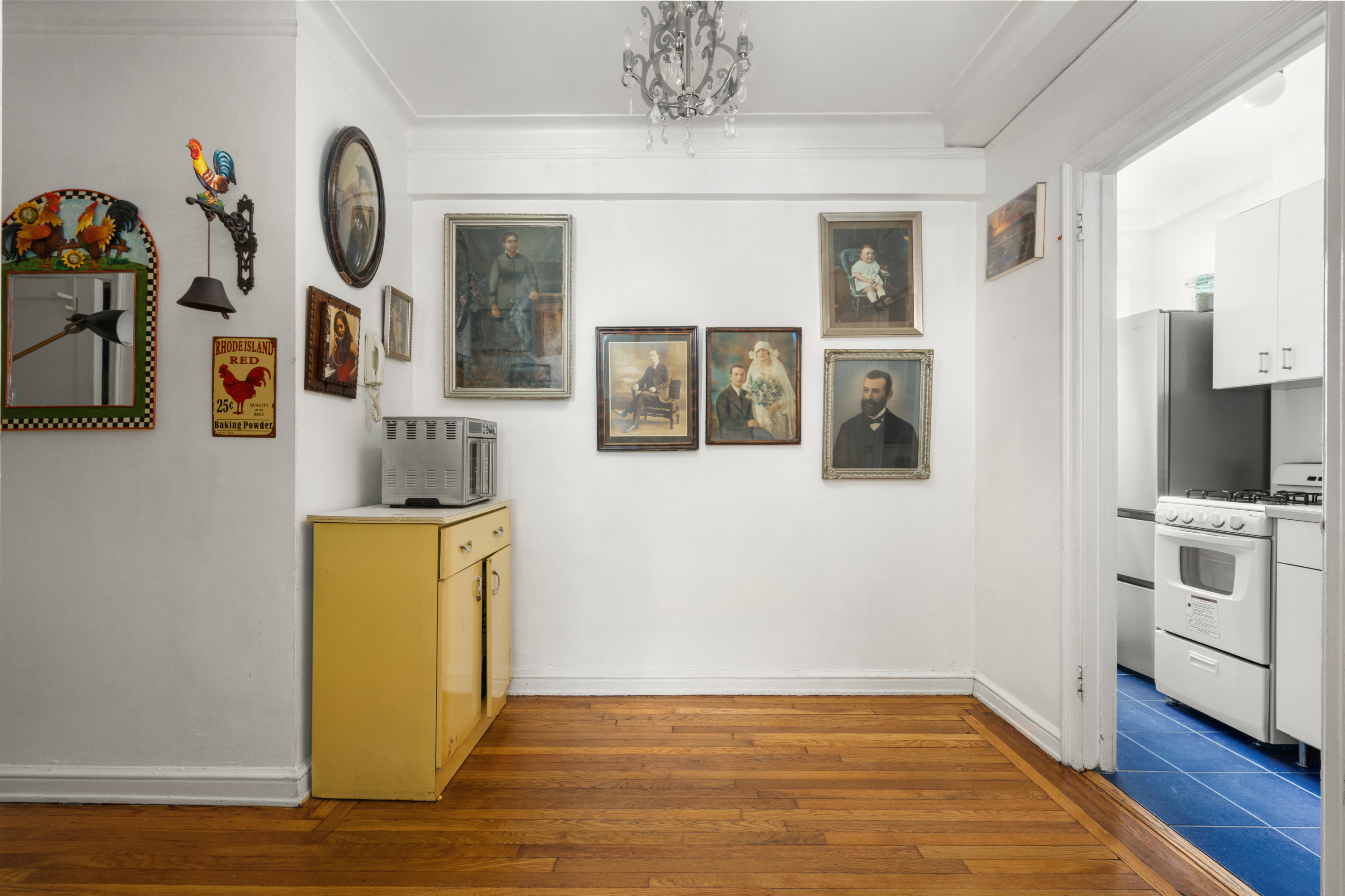 227 East 57th Street, Unit 3DEF Manhattan, NY 10022 - Photo 6 of 13 a view of an entryway with wooden floor