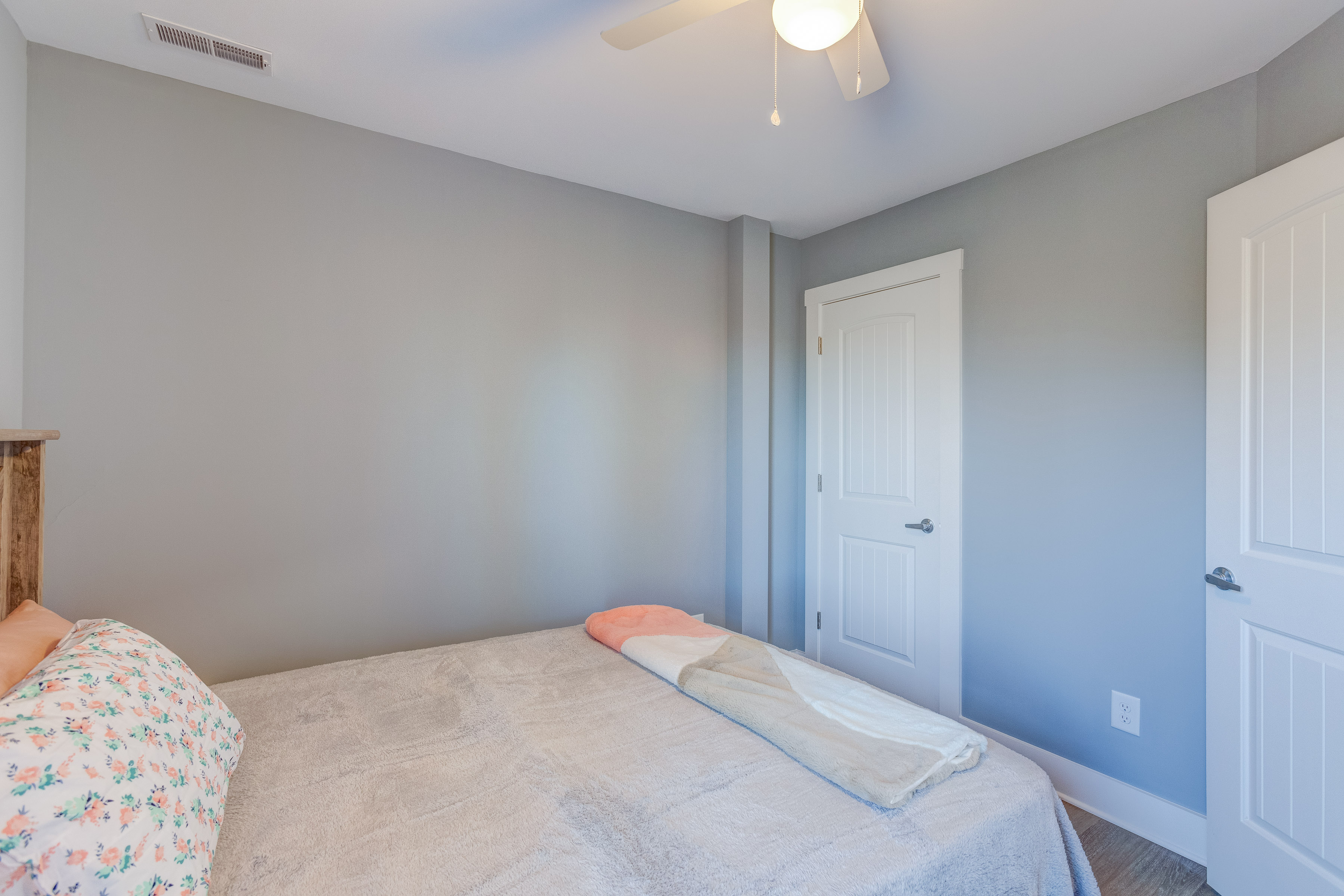 Happy Hollow Road Goodlettsville, TN 37072 - Photo 175 of 203 a bedroom with a bed and a chandelier fan