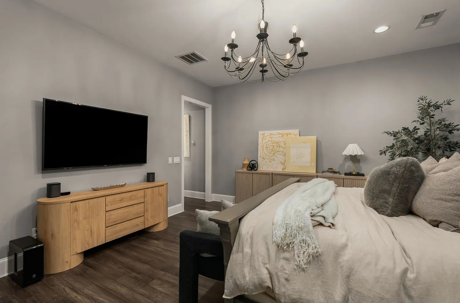 a bathroom with a granite countertop bathtub shower sink and toilet