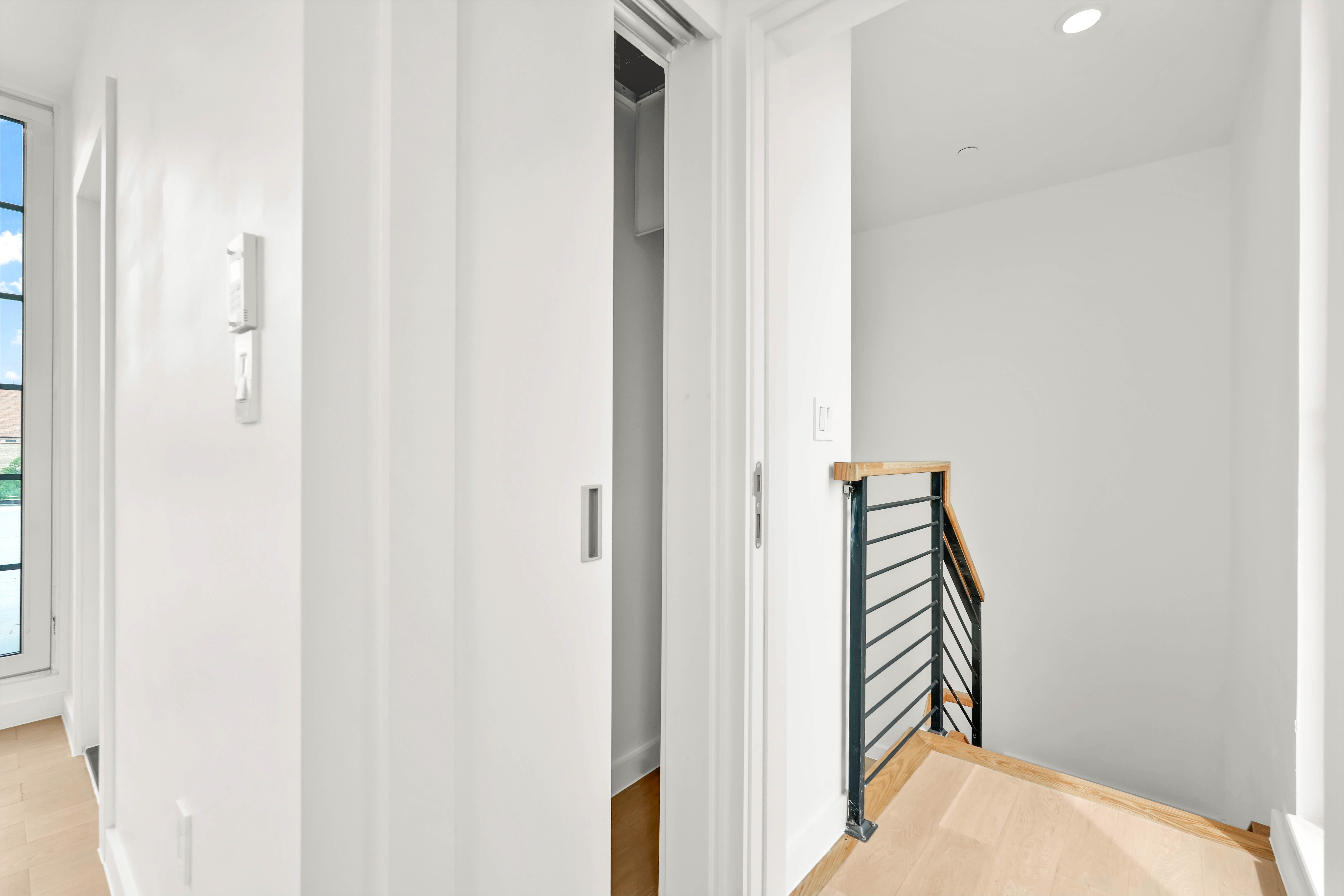 90 Herbert Street, Unit 4B Brooklyn, NY 11222 - Photo 12 of 16 a view of a hallway with wooden floor and entryway