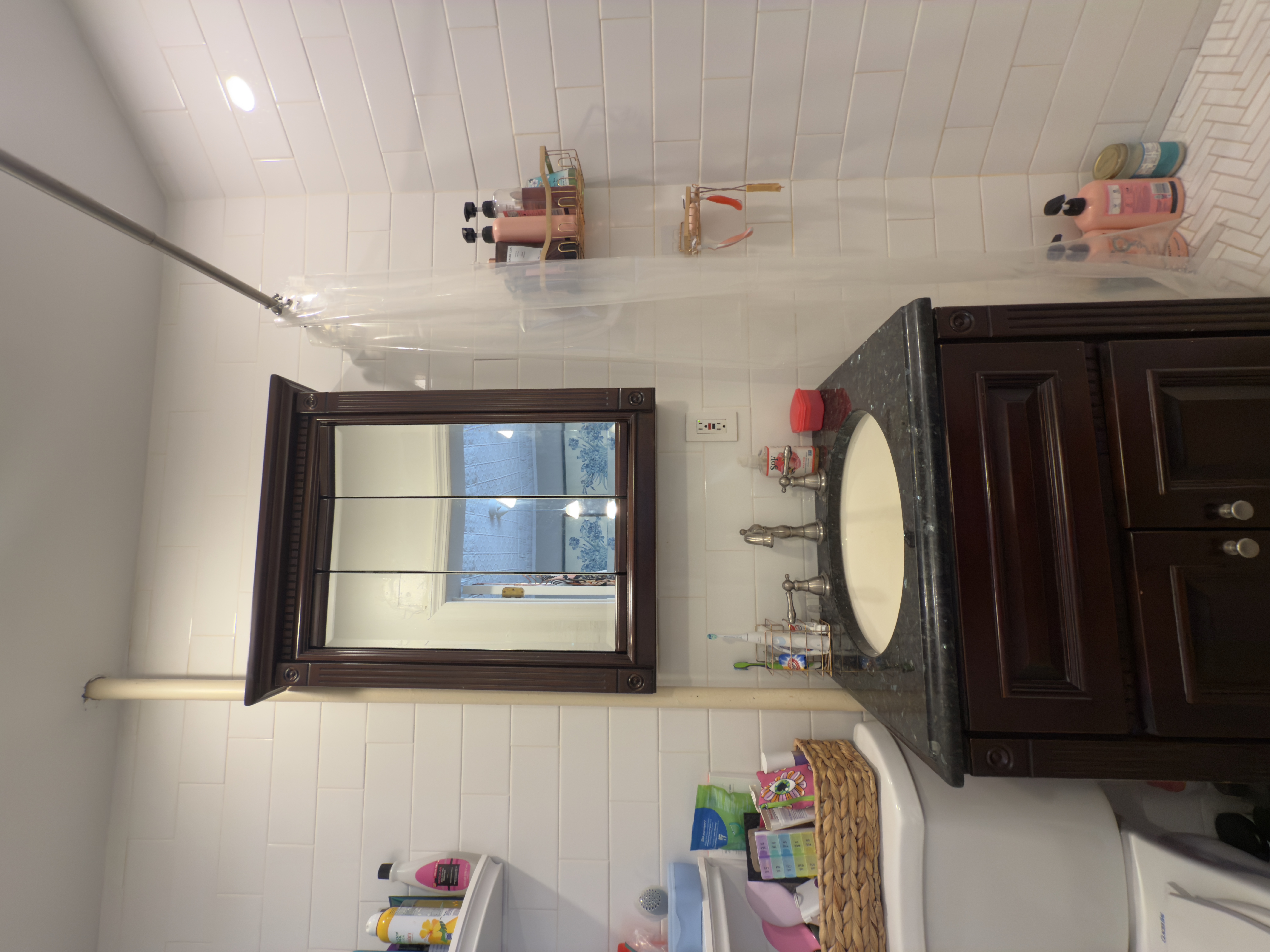 141 7th Avenue, Unit 1 Brooklyn, NY 11215 - Photo 14 of 16 a bathroom with a sink vanity and a mirror