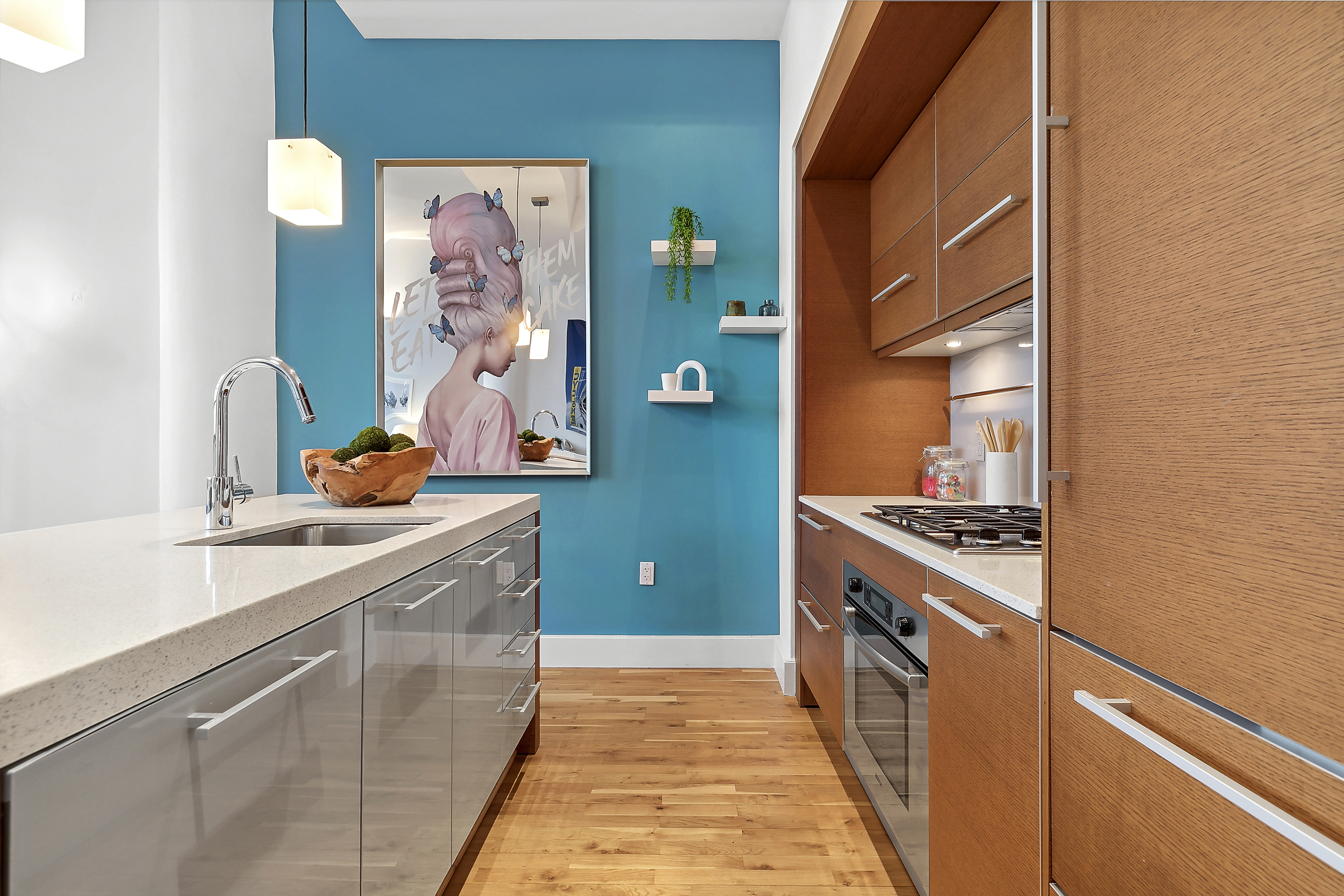 360 Furman Street, Unit 812 Brooklyn, NY 11201 - Photo 6 of 39 a kitchen with stainless steel appliances granite countertop a stove a sink and a microwave