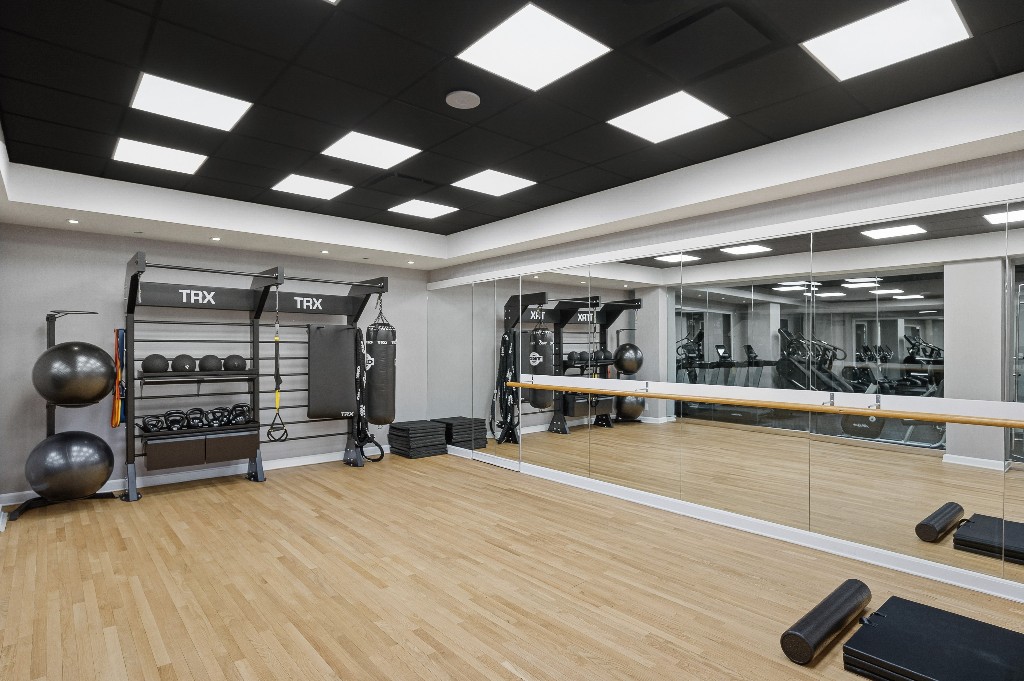 111 Fulton Street, Unit 824 Manhattan, NY 10038 - Photo 29 of 35 a view of a room with gym equipment