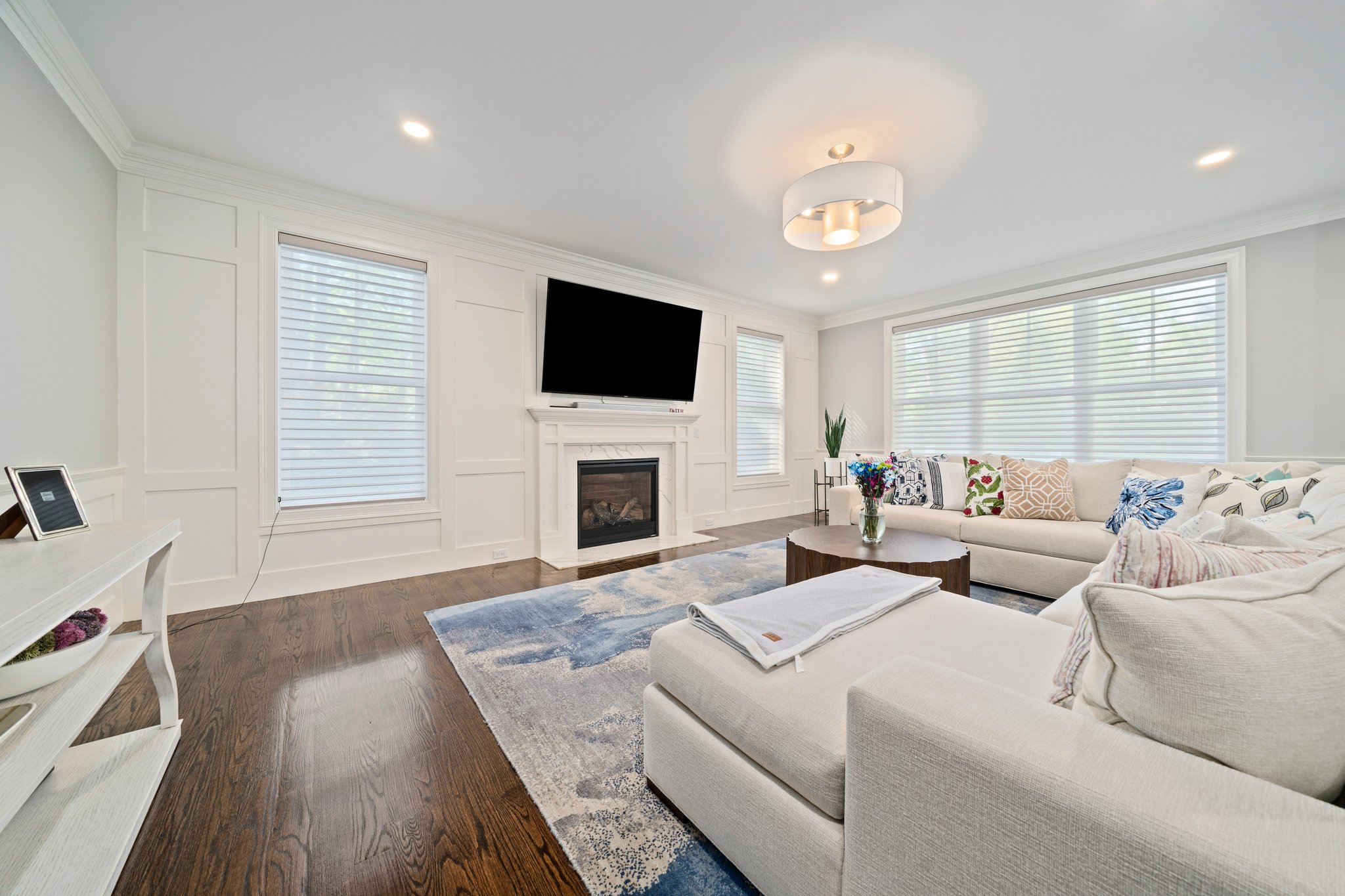 241 Lowell Road Wellesley, MA 02481 - Photo 18 of 85 a living room with fireplace furniture and a flat screen tv