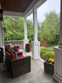 a view of living room with furniture and garden view