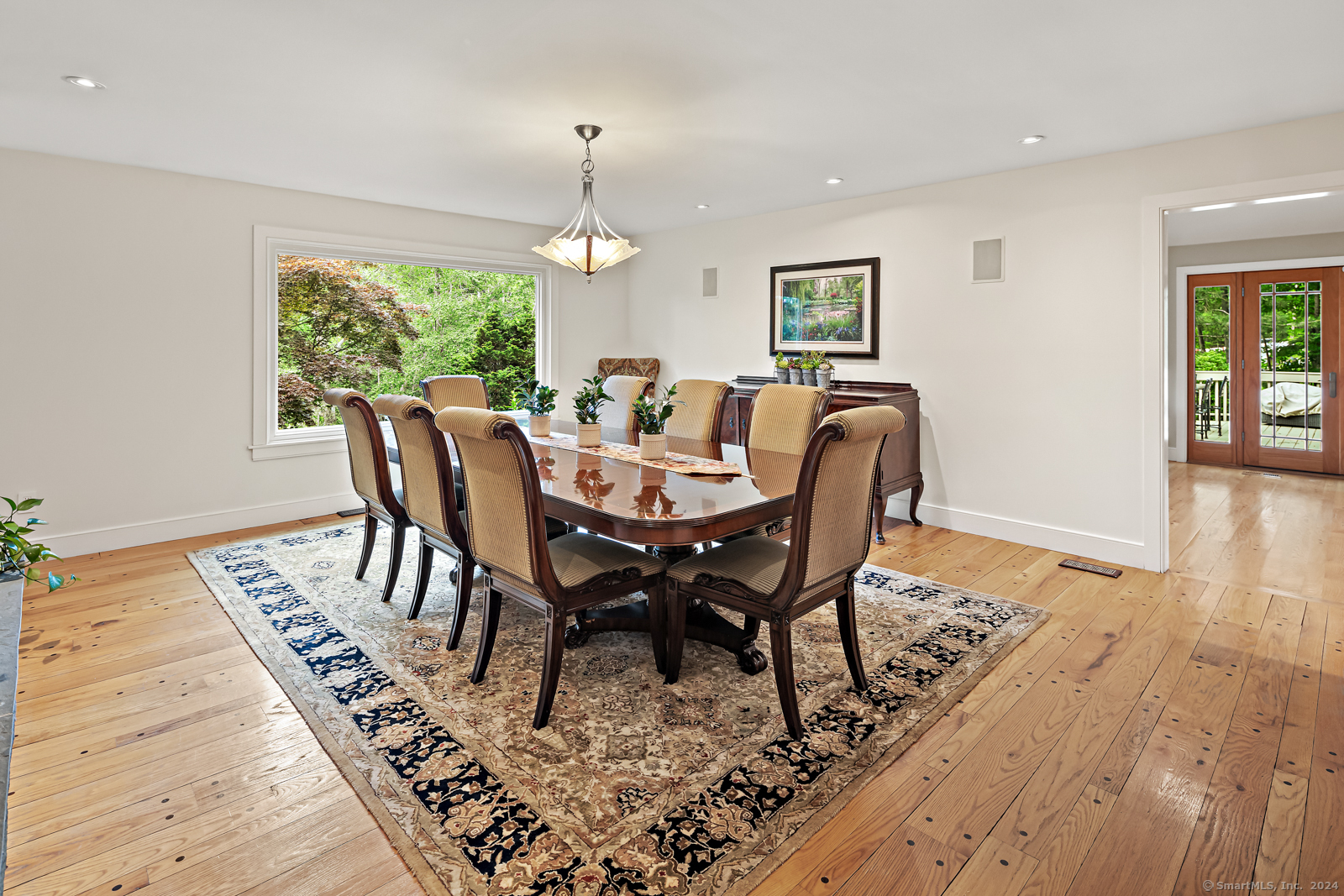 13 Bittersweet Road Weston, CT 06883 - Photo 9 of 35 a view of a dining room with furniture window and wooden floor