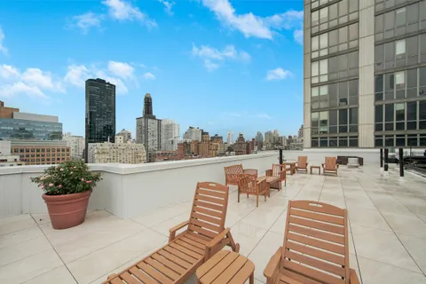 a view of a terrace with chairs