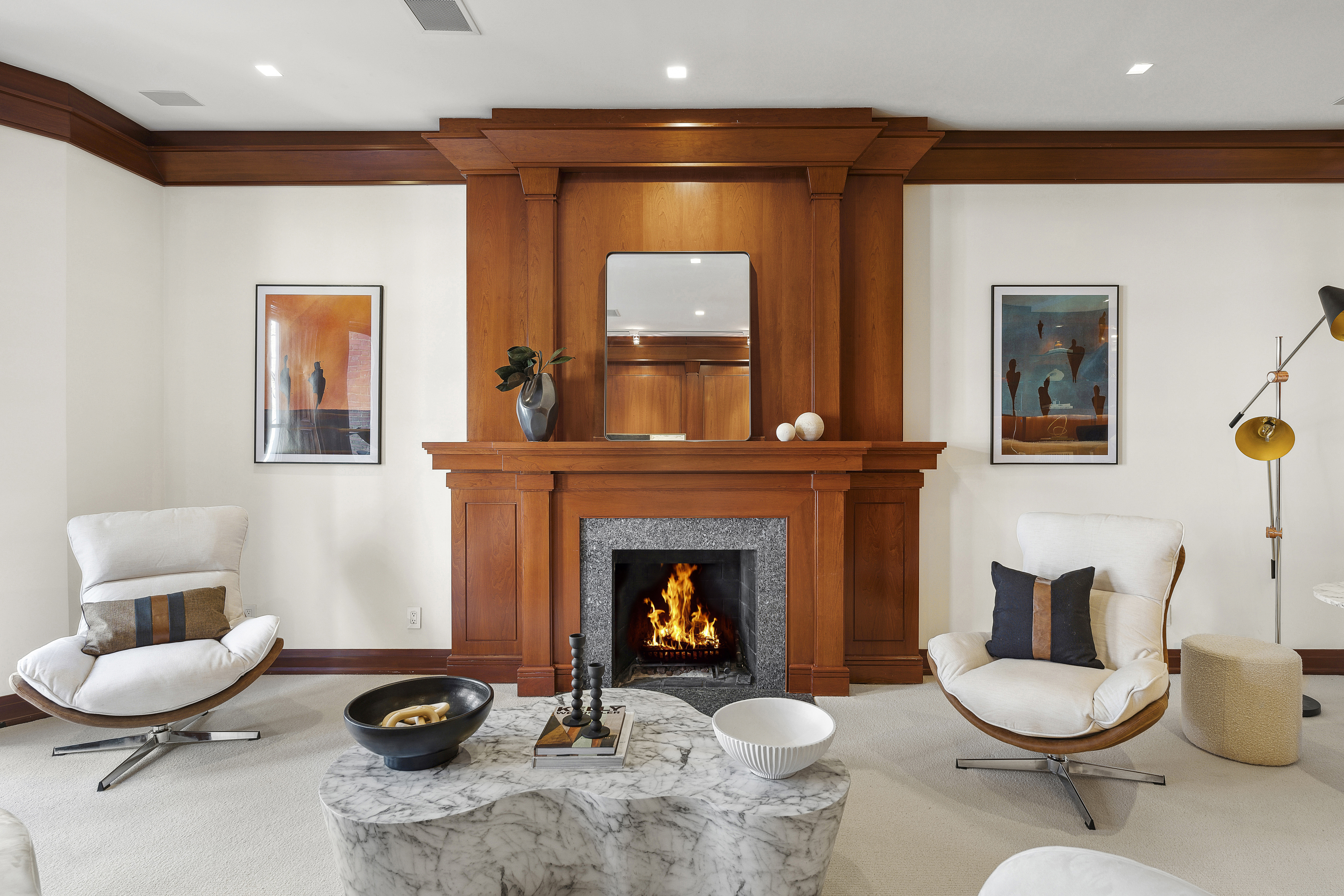 50 East 73rd Street Manhattan, NY 10021 - Photo 14 of 32 a living room with furniture a window and a fireplace