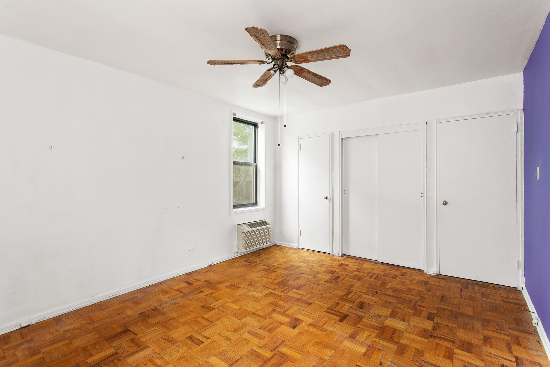 345 Webster Avenue, Unit 1U Brooklyn, NY 11230 - Photo 5 of 10 a view of a room with a ceiling fan