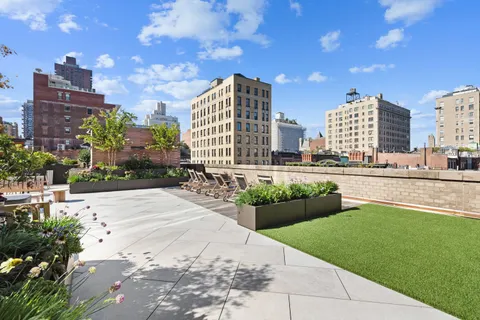 a view of a city with tall buildings