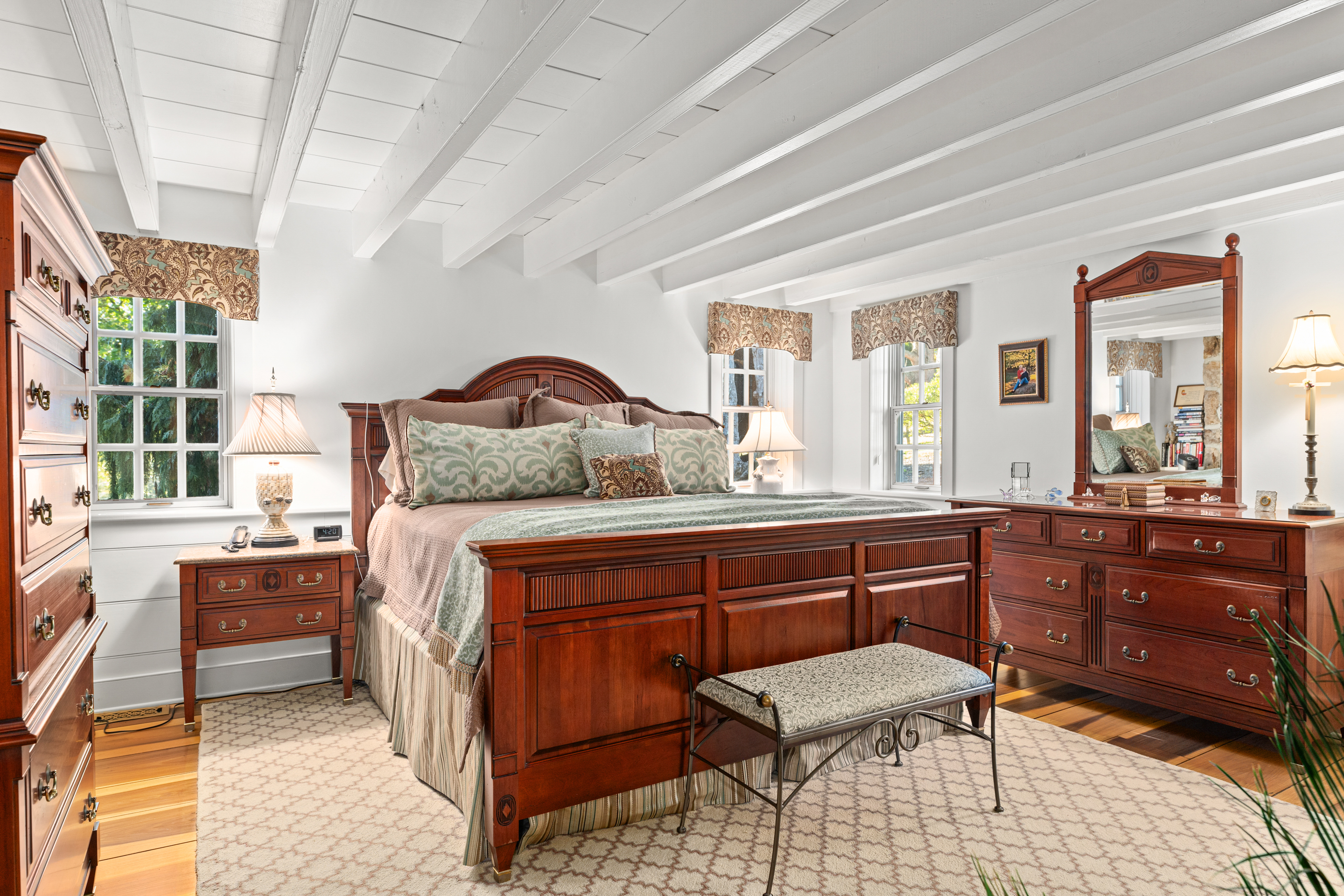 791 Grubbs Mill Road Berwyn, PA 19312 - Photo 28 of 76 a bedroom with a bed and wooden floor