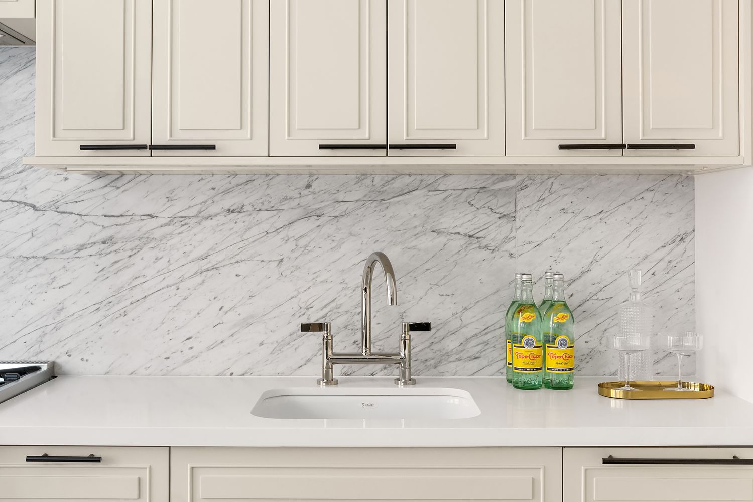 76 Schermerhorn Street, Unit 8E Brooklyn, NY 11201 - Photo 4 of 8 a view of kitchen with granite countertop white cabinets and a sink