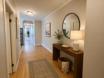 a kitchen with a refrigerator sink and cabinets