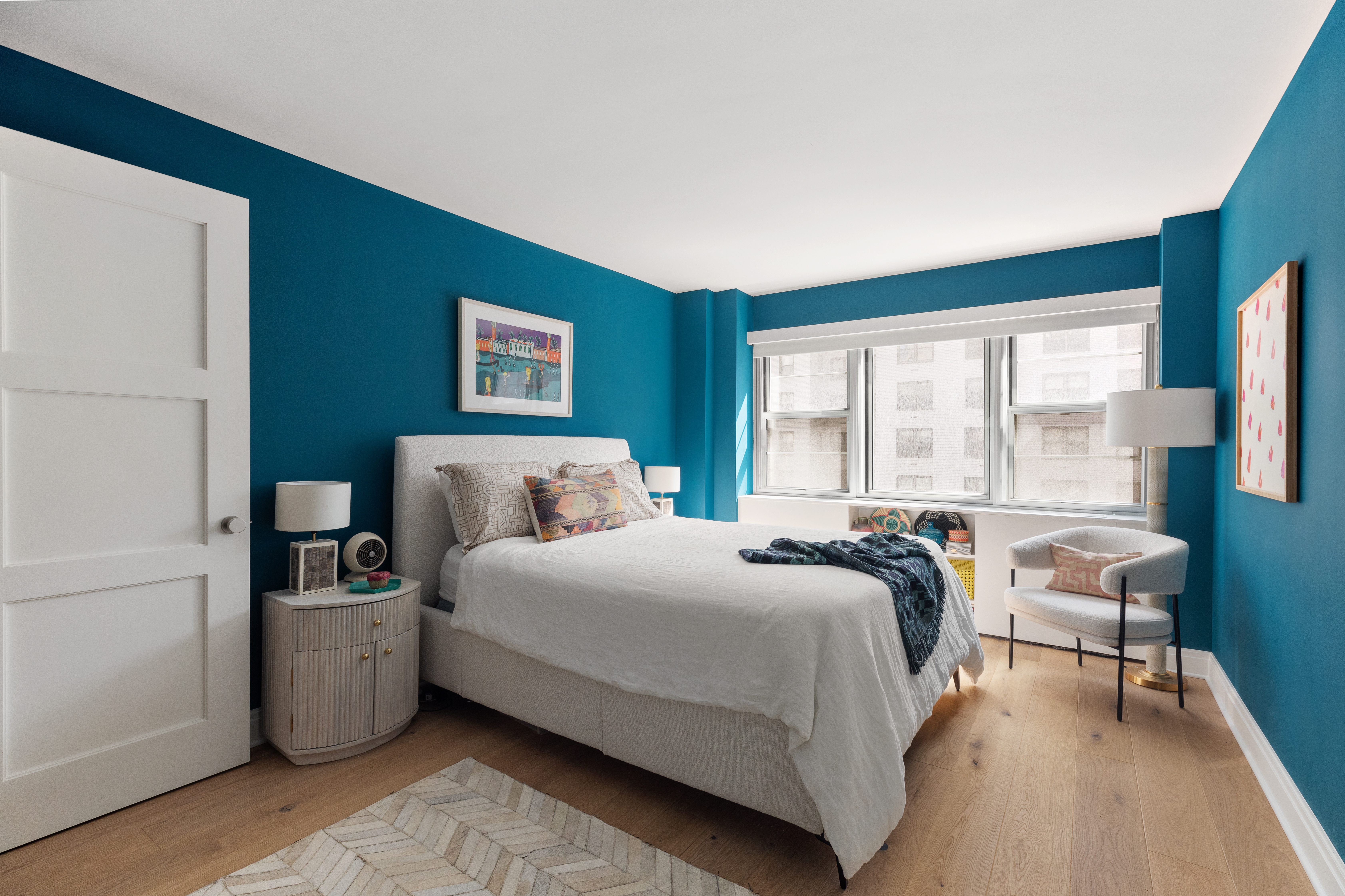 39 Gramercy Park North, Unit 6F Manhattan, NY 10010 - Photo 6 of 8 a bedroom with bed and a large window