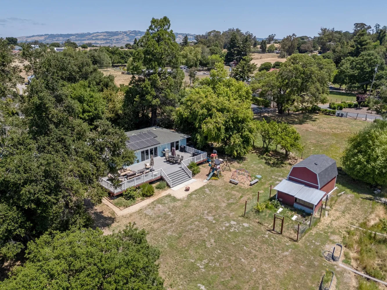 an aerial view of a house with garden