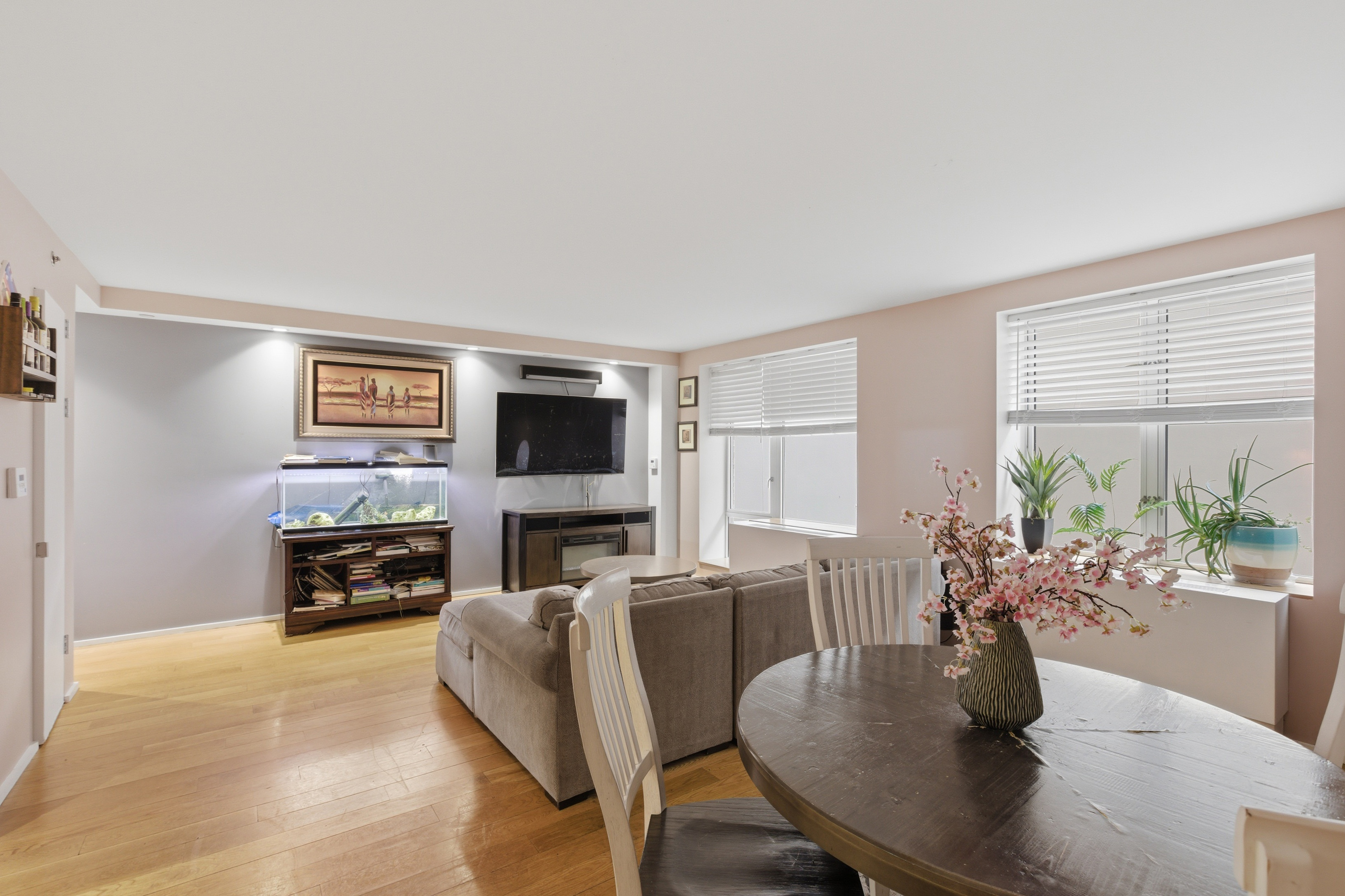 2280 Frederick Douglass Boulevard Manhattan, NY 10027 - Photo 4 of 10 a living room with furniture and a flat screen tv