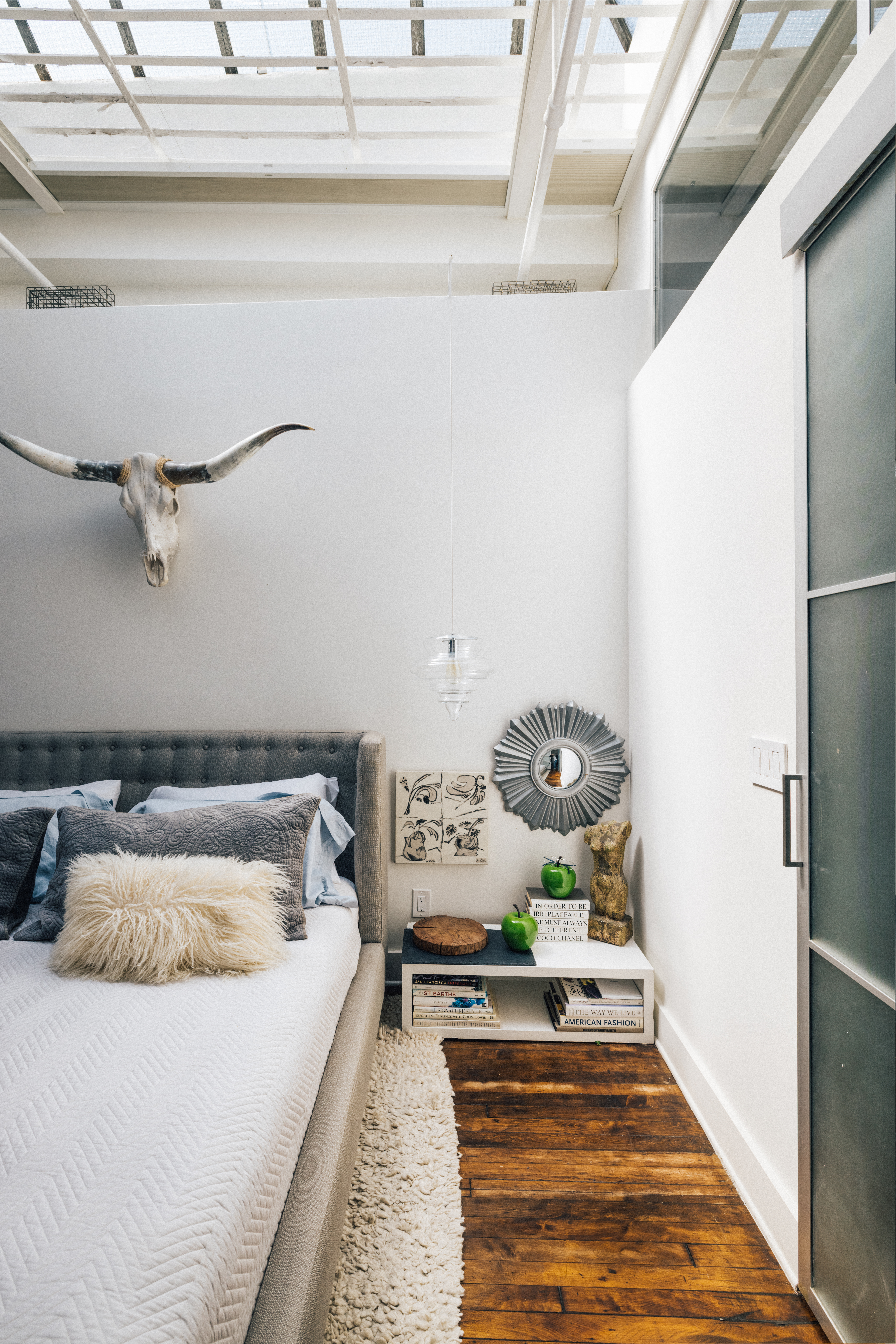 718 Broadway, Unit PHC Manhattan, NY 10003 - Photo 6 of 21 a bedroom with a bed and a dresser