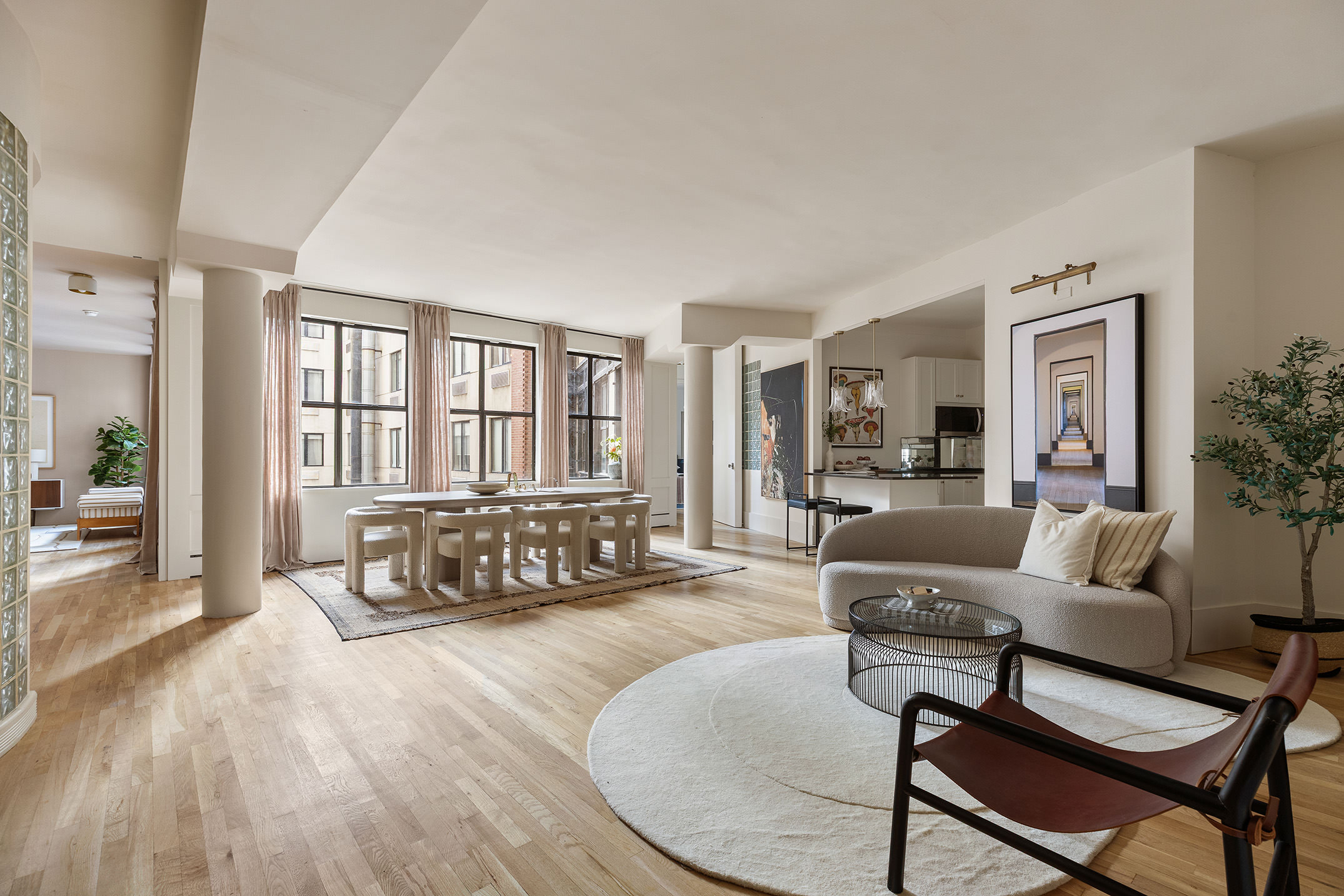 260 West Broadway, Unit 4C Manhattan, NY 10013 - Photo 2 of 28 a living room with furniture and a table