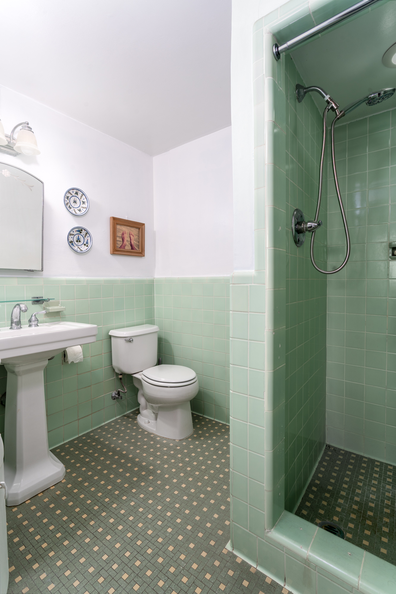 180 Cabrini Boulevard, Unit 61 Manhattan, NY 10033 - Photo 14 of 33 a bathroom with a toilet a sink and shower