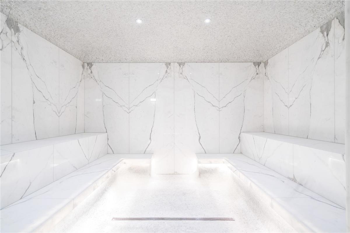 50 West Street, Unit 14B Manhattan, NY 10006 - Photo 21 of 29 a bathroom with a bathtub and a shower