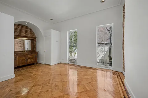 a view of livingroom with furniture and window
