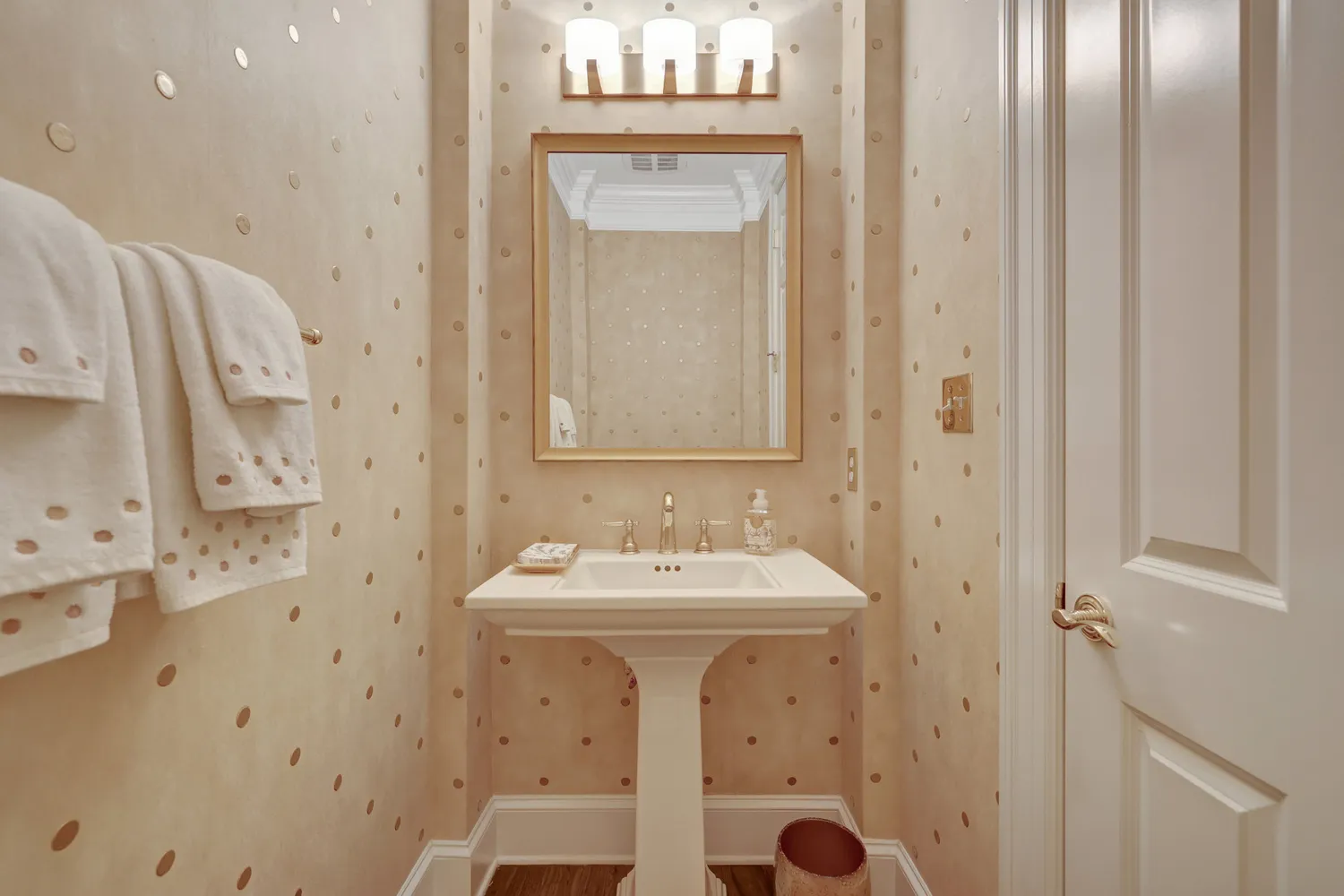 a bathroom with a shower sink and mirror