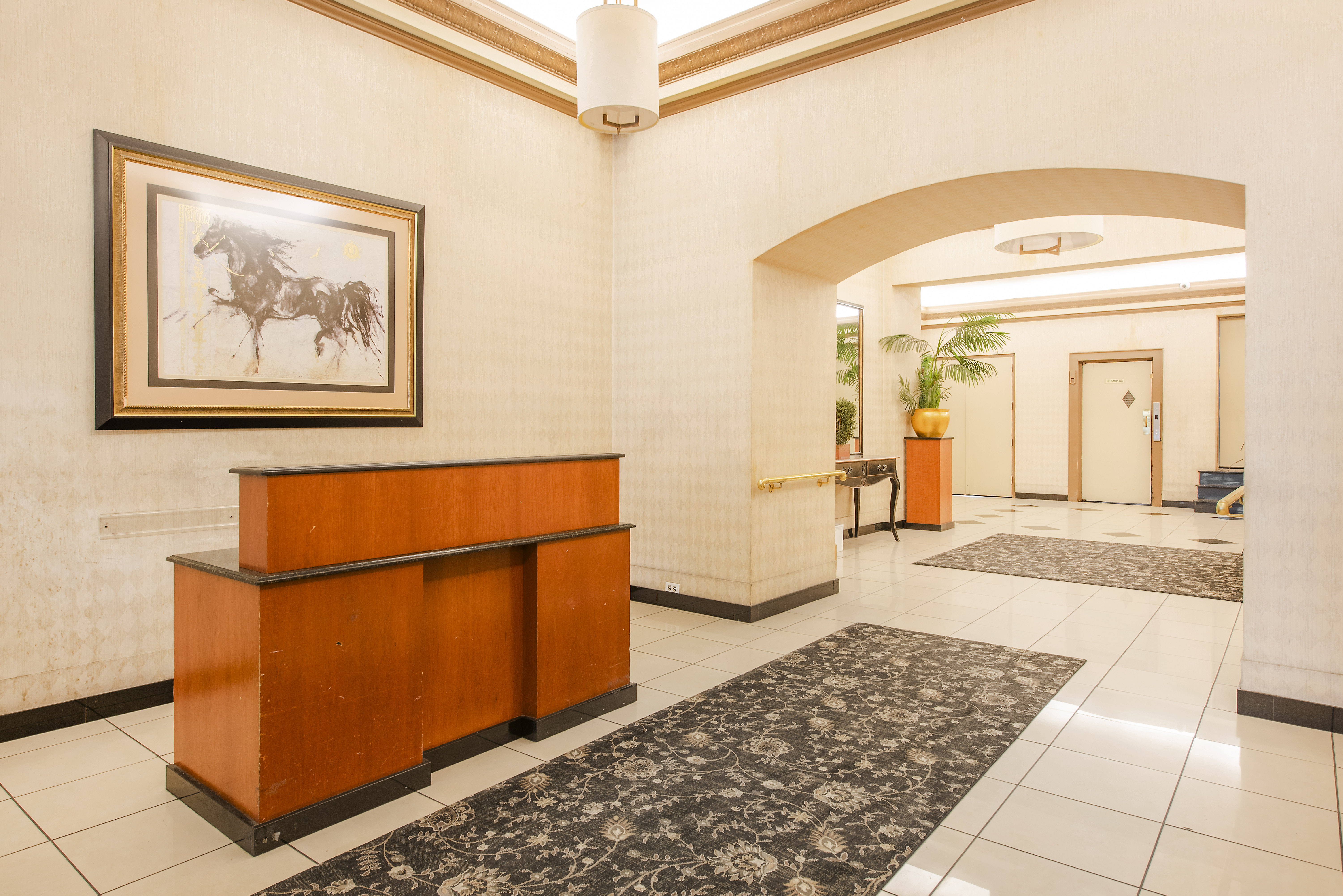 200 West 93rd Street, Unit 2E Manhattan, NY 10025 - Photo 6 of 6 a view of a hallway with wooden floor and a living room