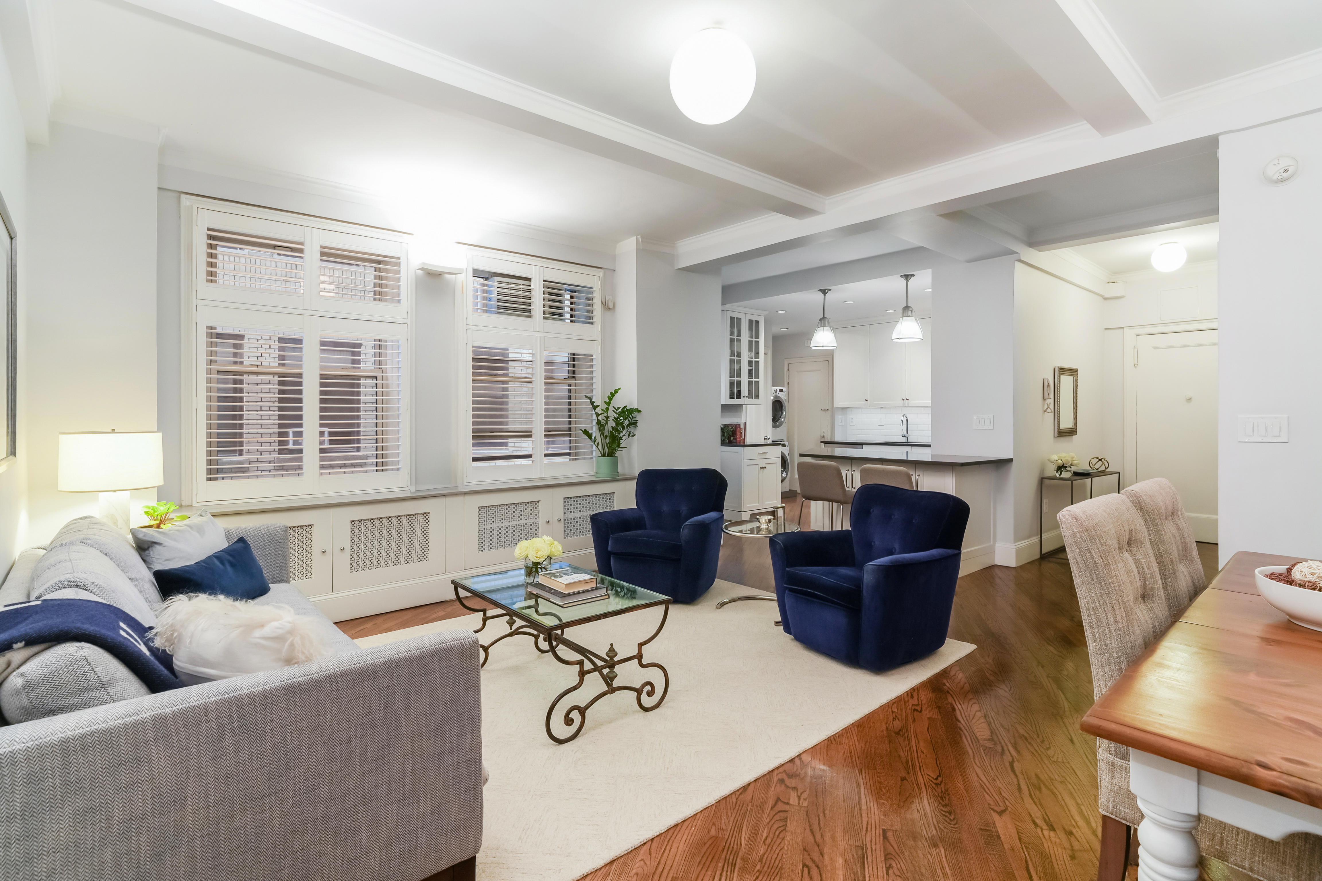 240 West 98th Street, Unit 3D Manhattan, NY 10025 - Photo 1 of 12 a living room with furniture and a large window