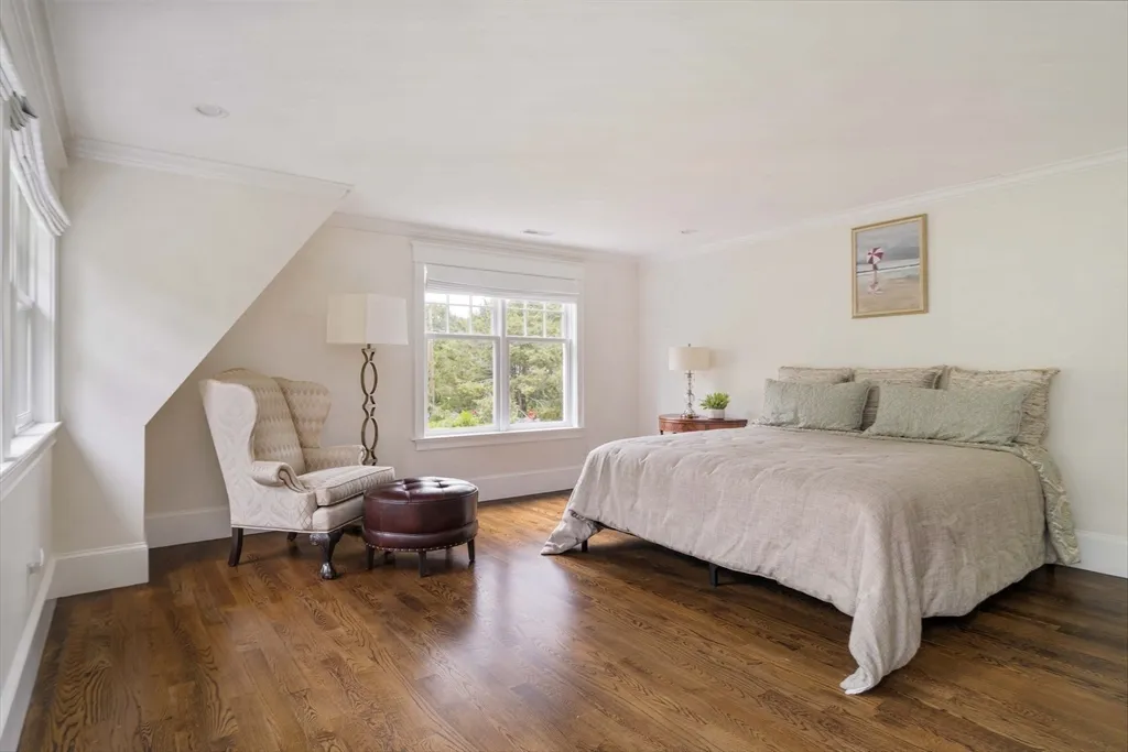 a bed room with a bed and a window