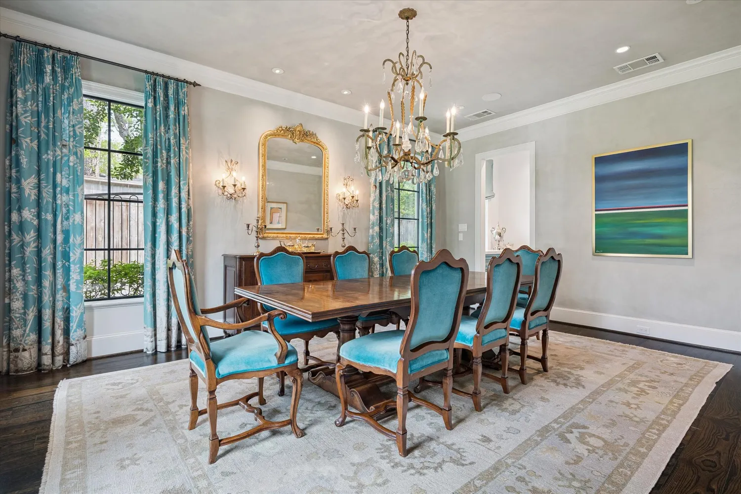 a view of a dining room with furniture and window