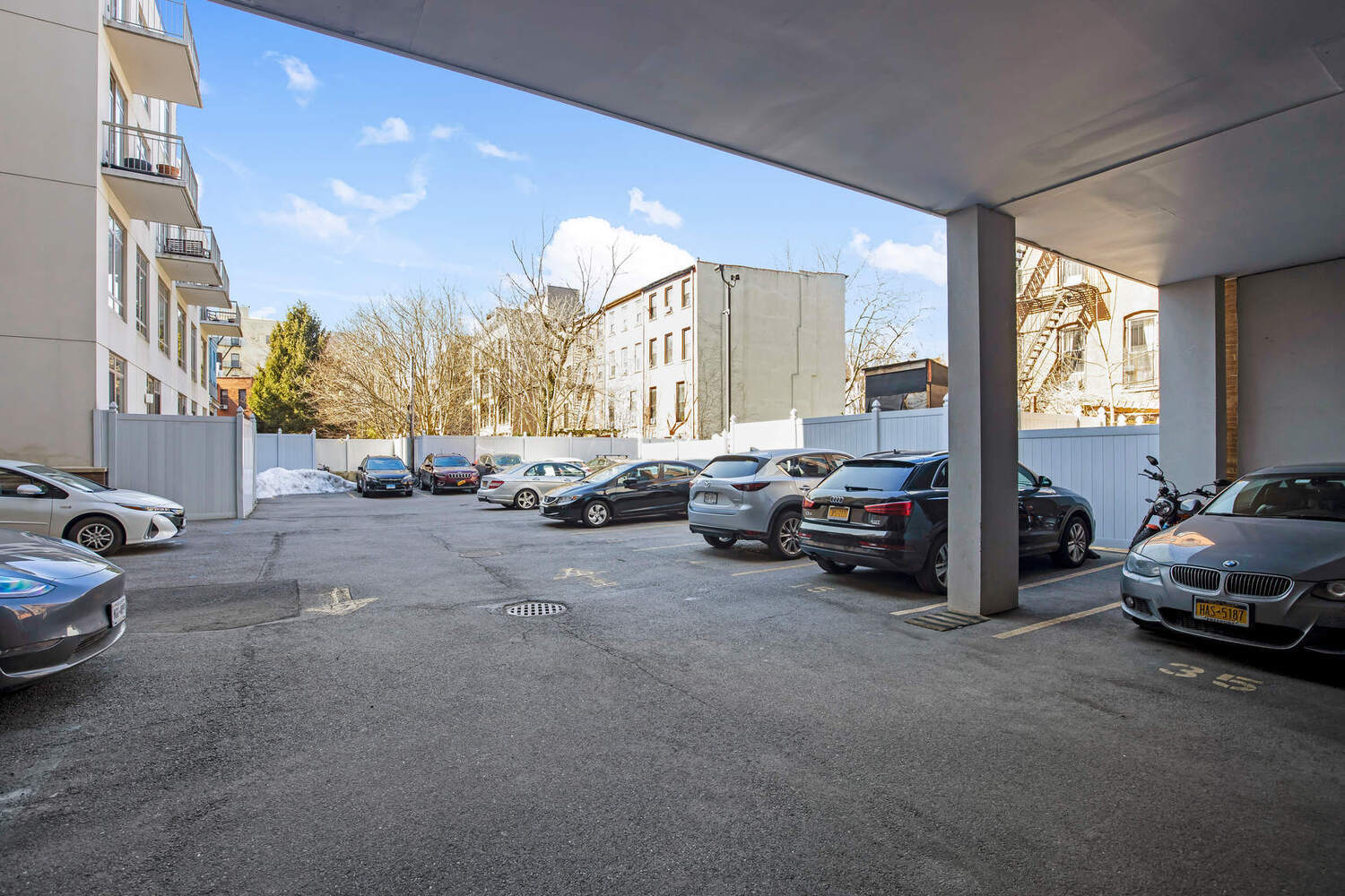 315 Gates Avenue, Unit 3H Brooklyn, NY 11216 - Photo 11 of 12 a living room with furniture and a large window