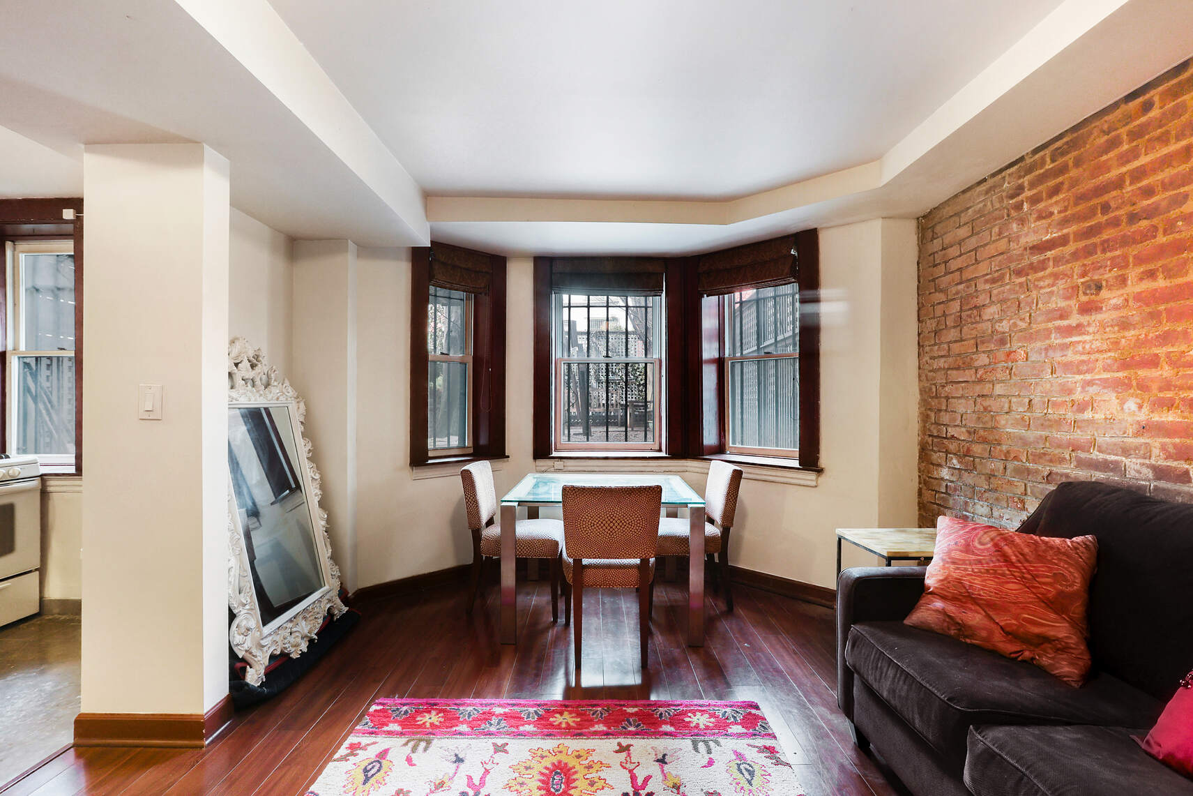 261 Fenimore Street Brooklyn, NY 11225 - Photo 15 of 21 a living room with furniture and a large window