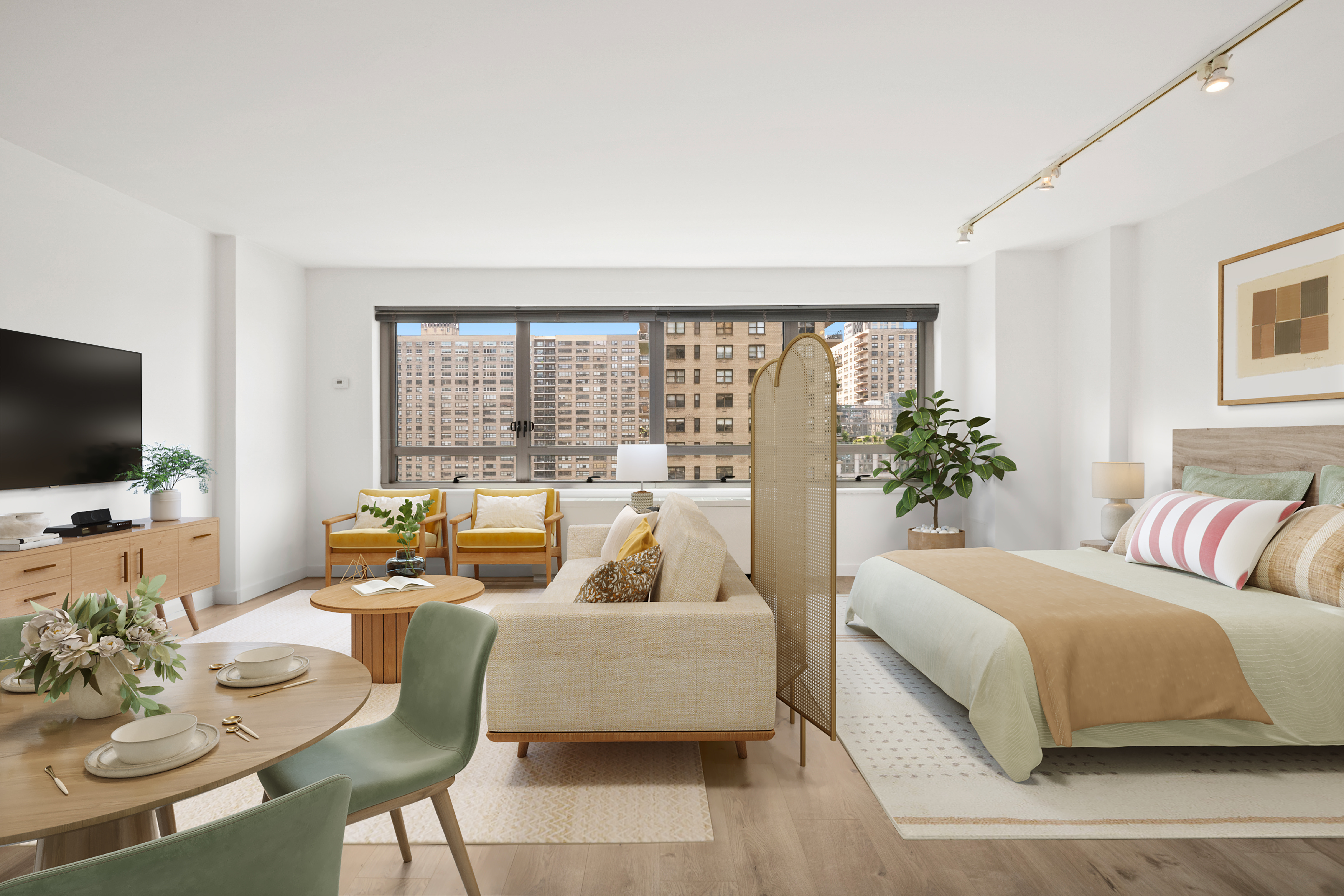 a bedroom with a large bed and a flat screen tv