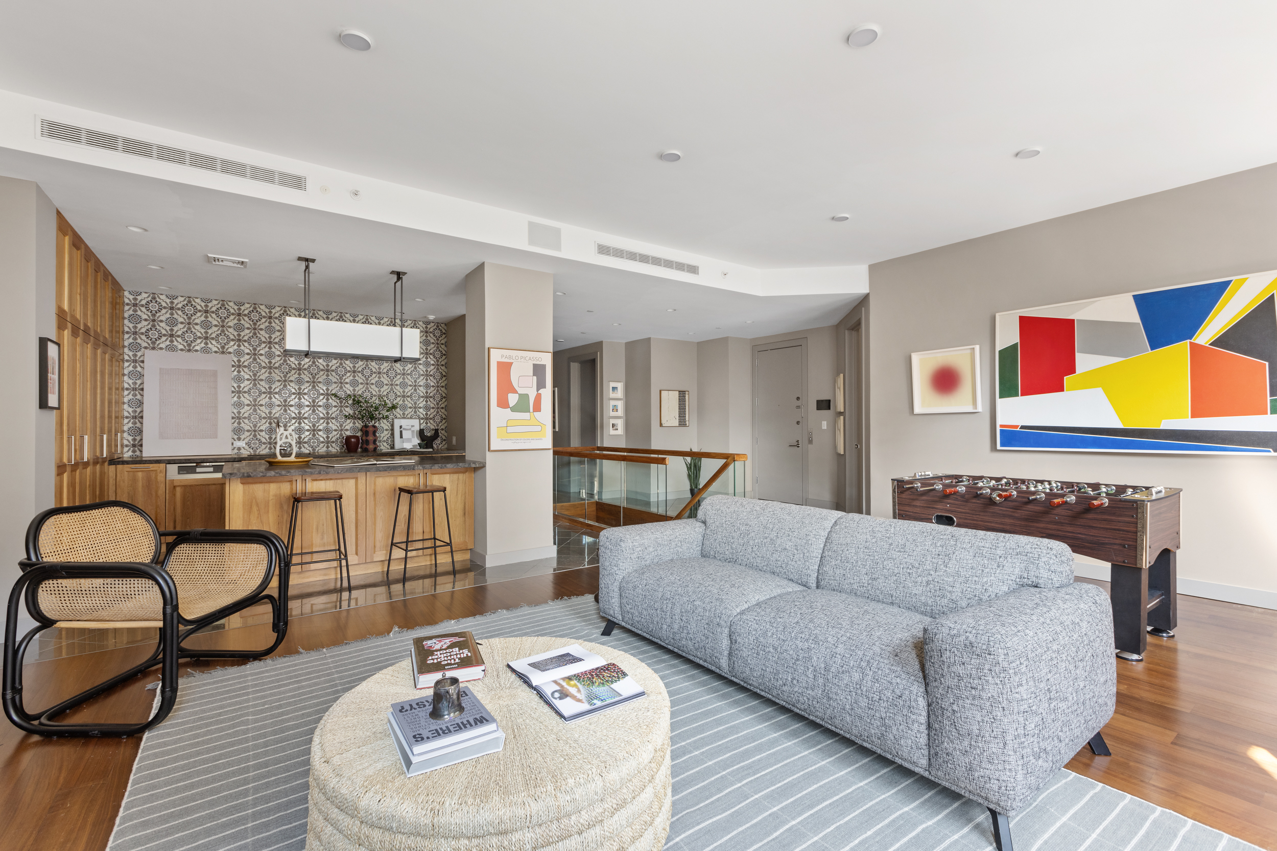 95 Charles Street, Unit TH Manhattan, NY 10014 - Photo 24 of 29 a living room with furniture and kitchen view