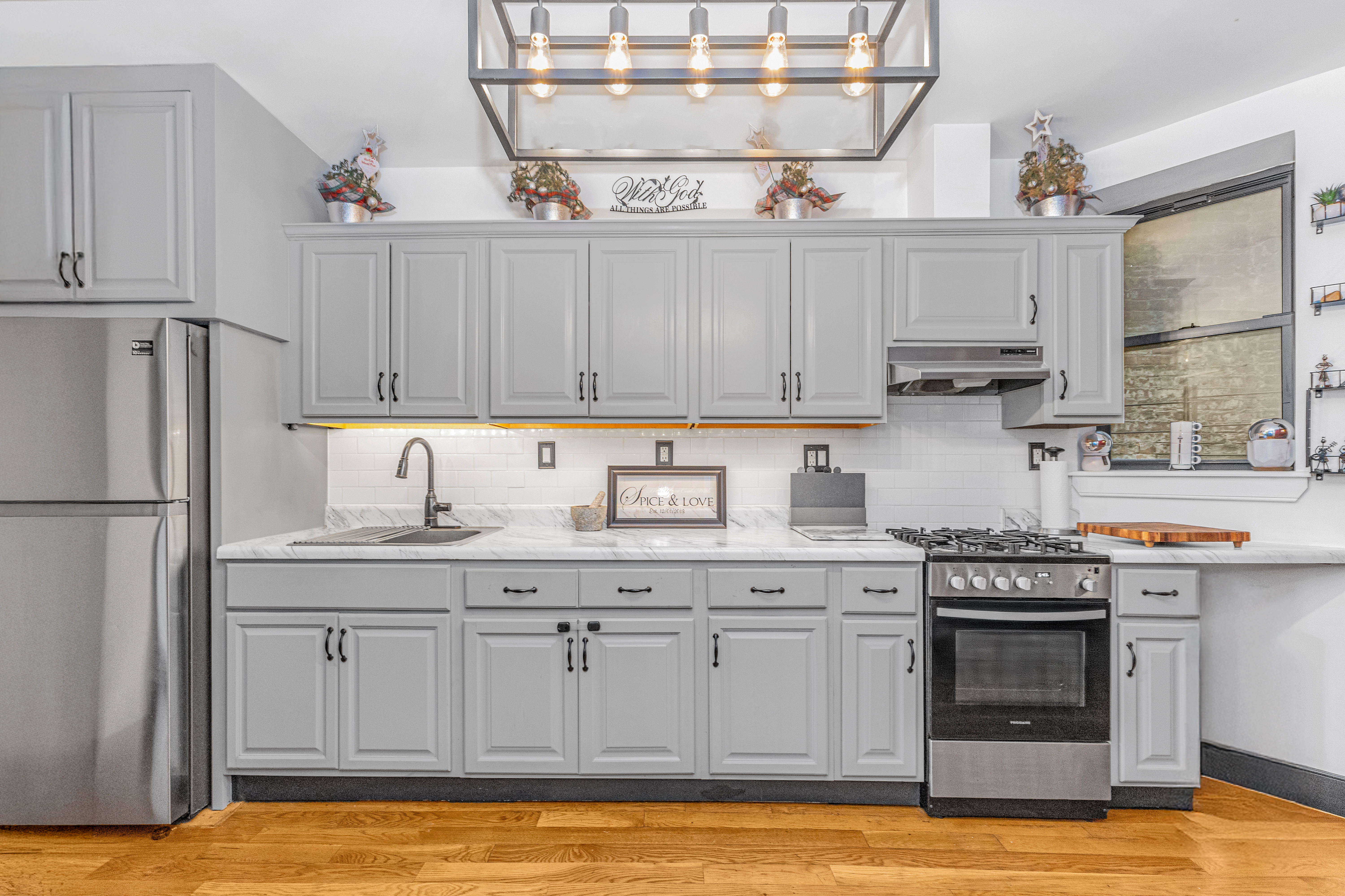 786 Madison Street, Unit 3B Brooklyn, NY 11221 - Photo 2 of 11 a kitchen with stainless steel appliances granite countertop a stove a sink and a refrigerator