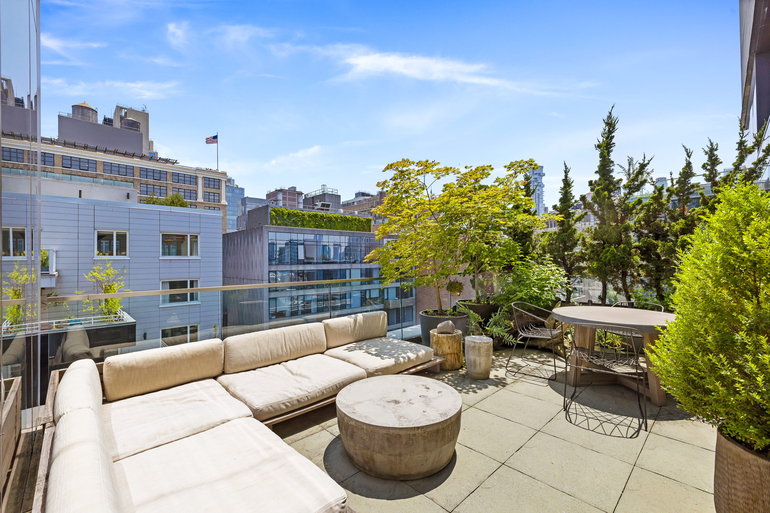 15 Renwick Street, Unit PH2 Manhattan, NY 10013 - Photo 9 of 23 a view of a patio with couches and potted plants